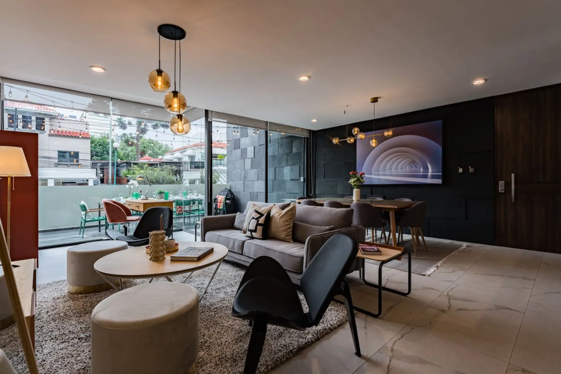 Chic living room with floor-to-ceiling windows for abundant natural light.