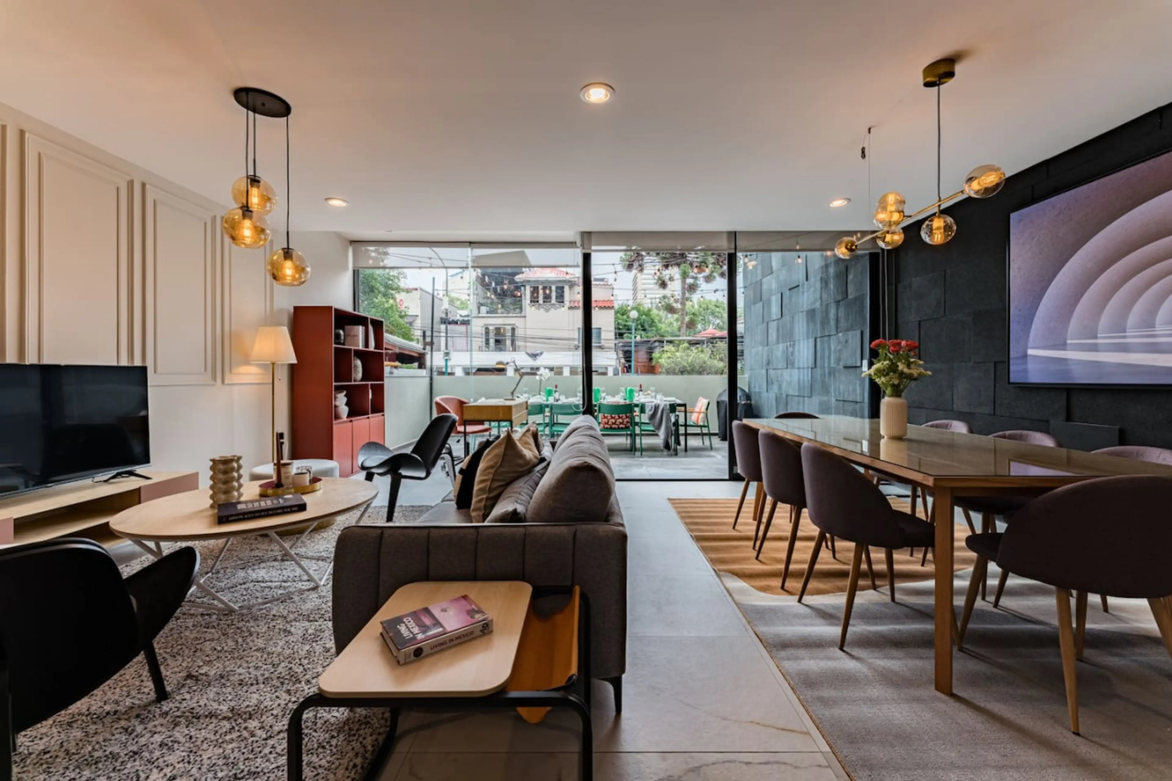 Open-concept living and dining area with seamless access to the balcony, designed for entertaining and relaxation.