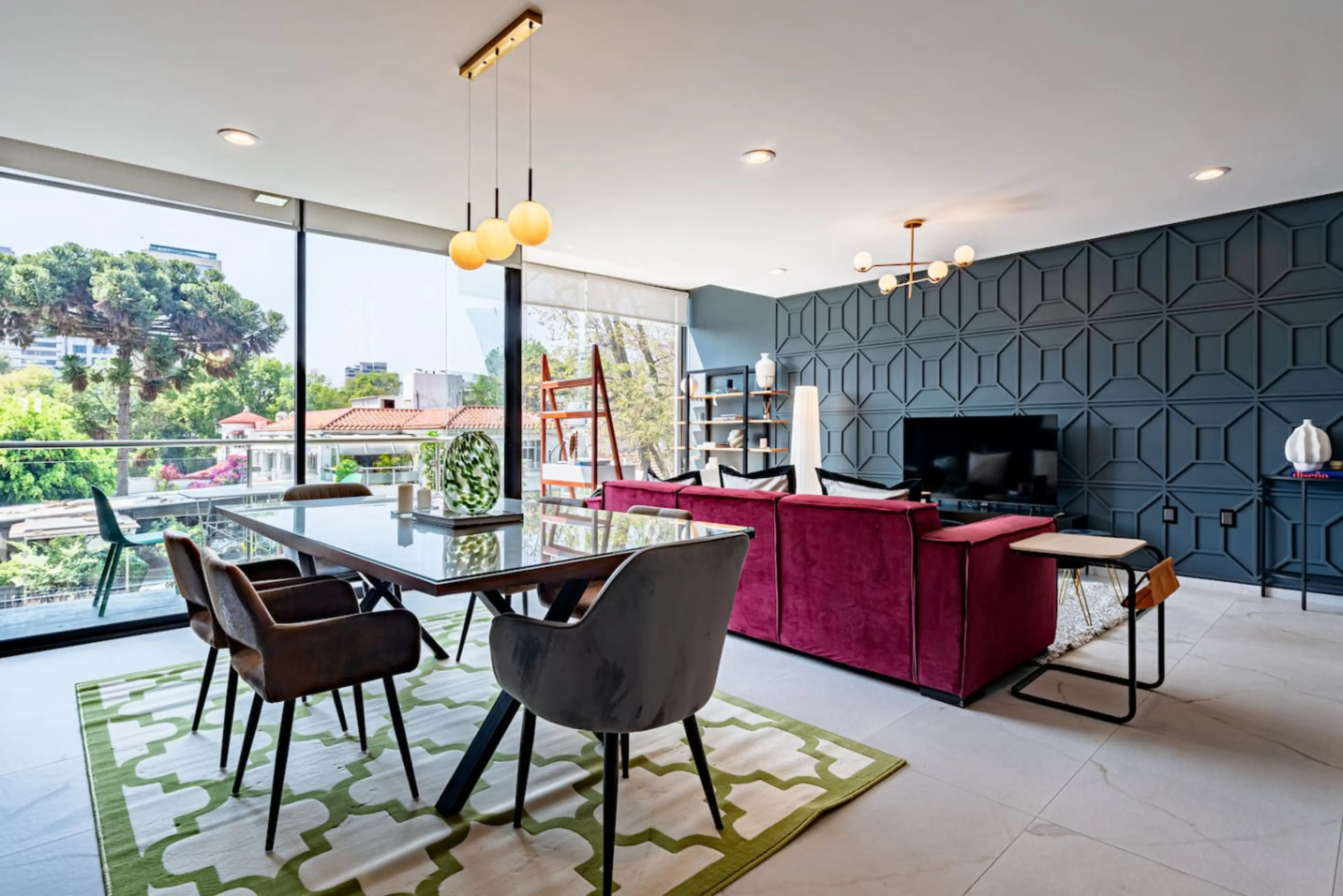 Another look at the cozy living room, framed by oversized windows and light