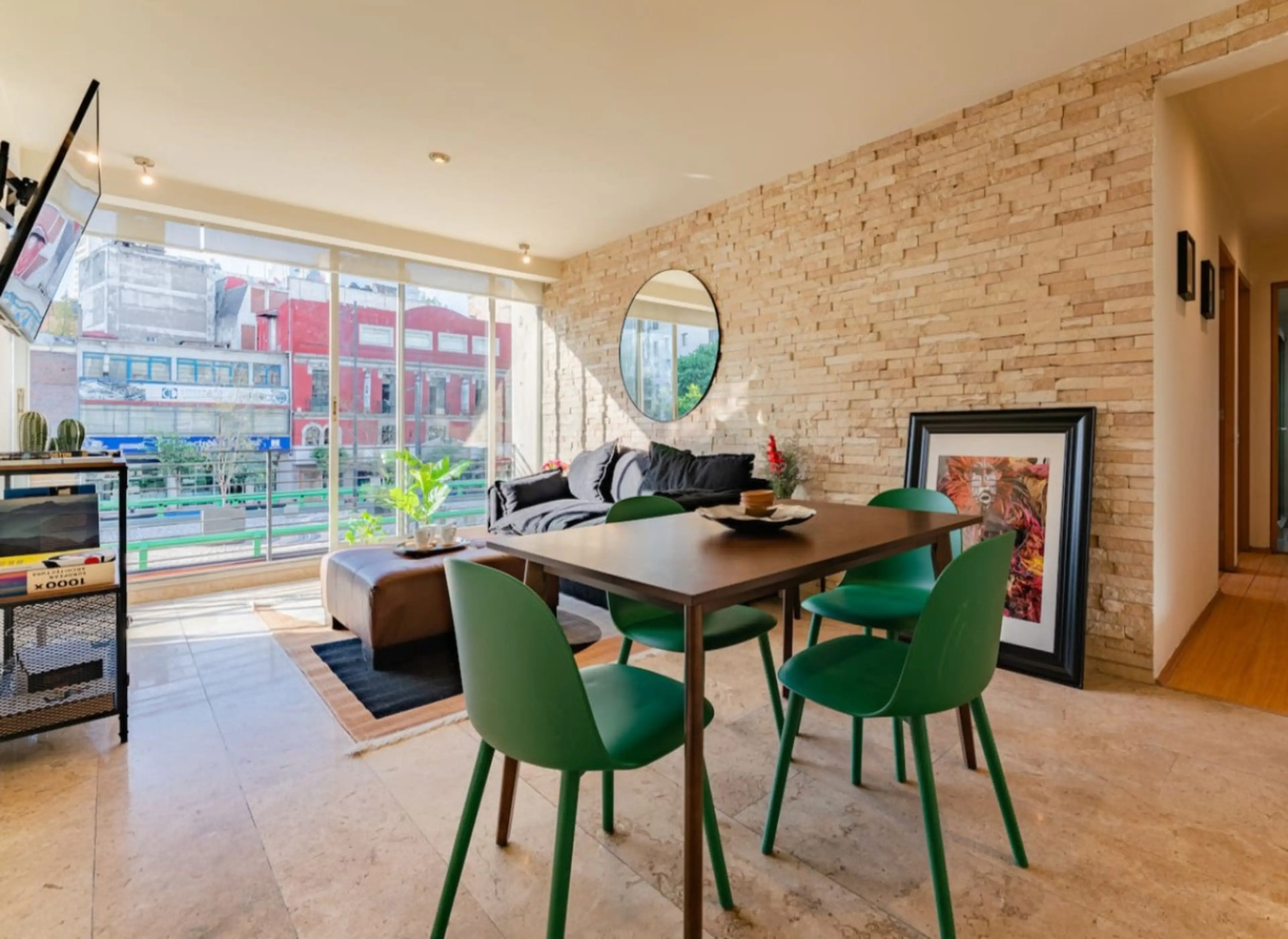 Floor-to-ceiling windows, Roma vibes, and a dining table made for good conversation.