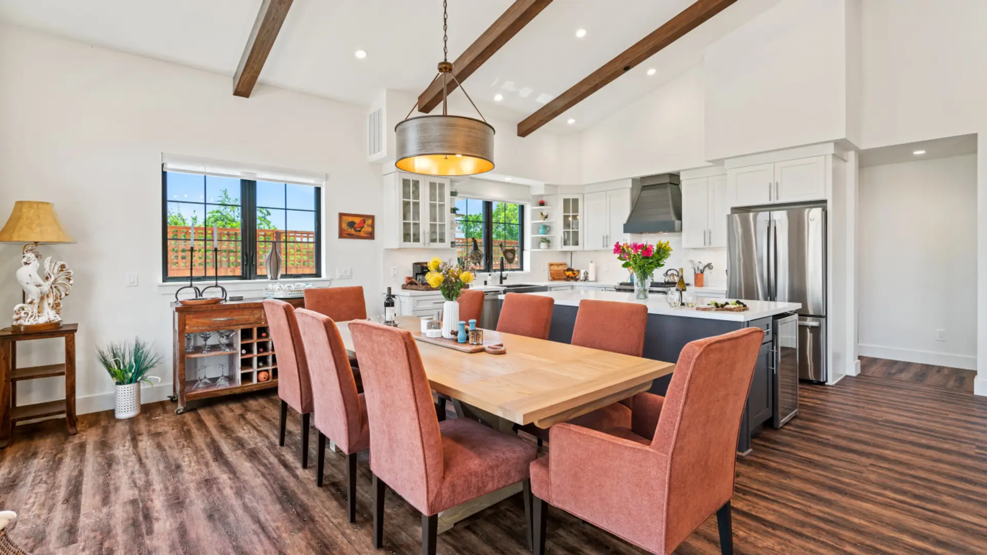 Gather in an elegant yet comfortable dining space adjacent to the kitchen and living room