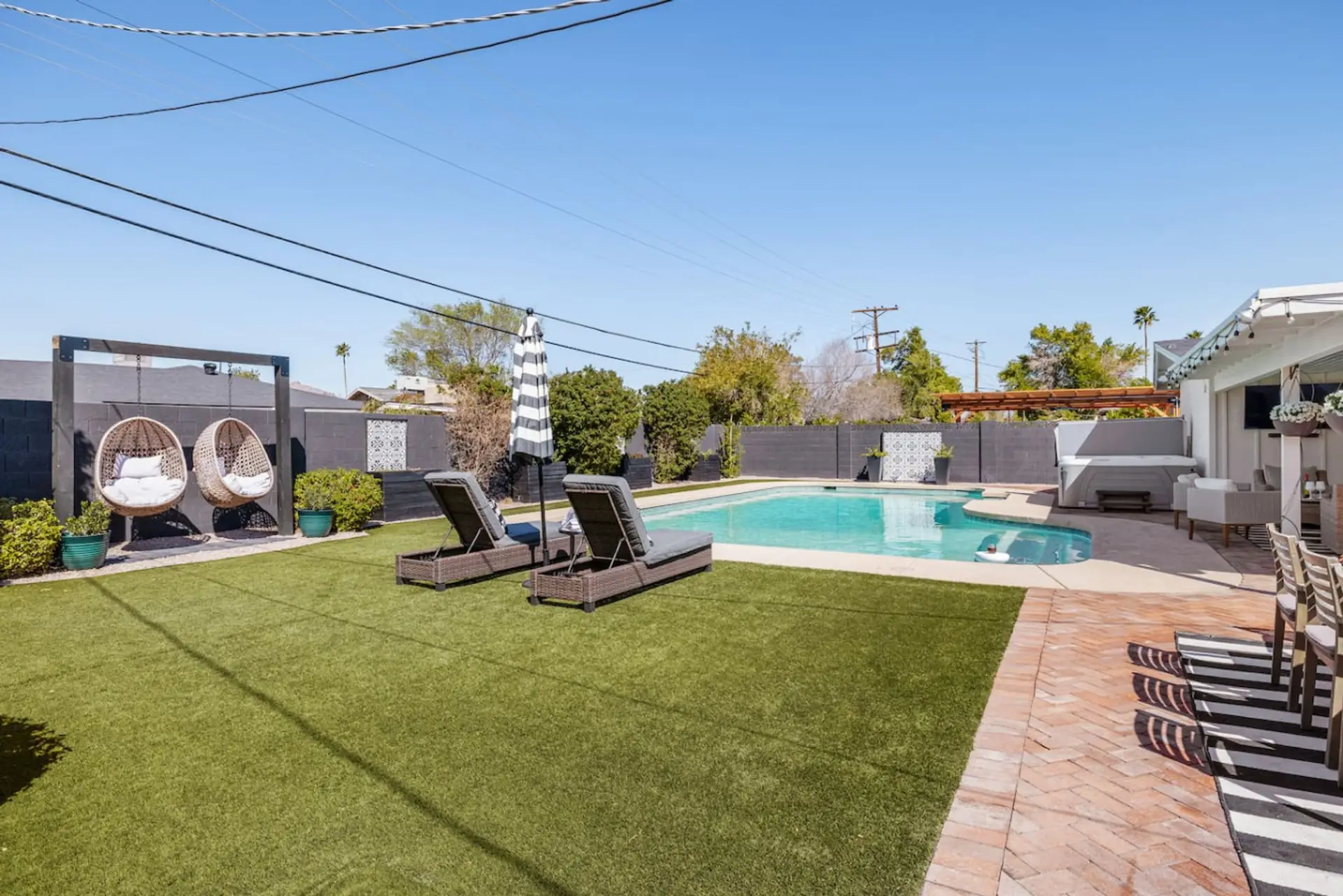 Private Oasis! This spacious  backyard is perfect for kids to run around or for a peaceful yoga session in the fresh air.  Inquire about our private yoga sessions, available for booking directly through us, for the ultimate relaxation experience!
