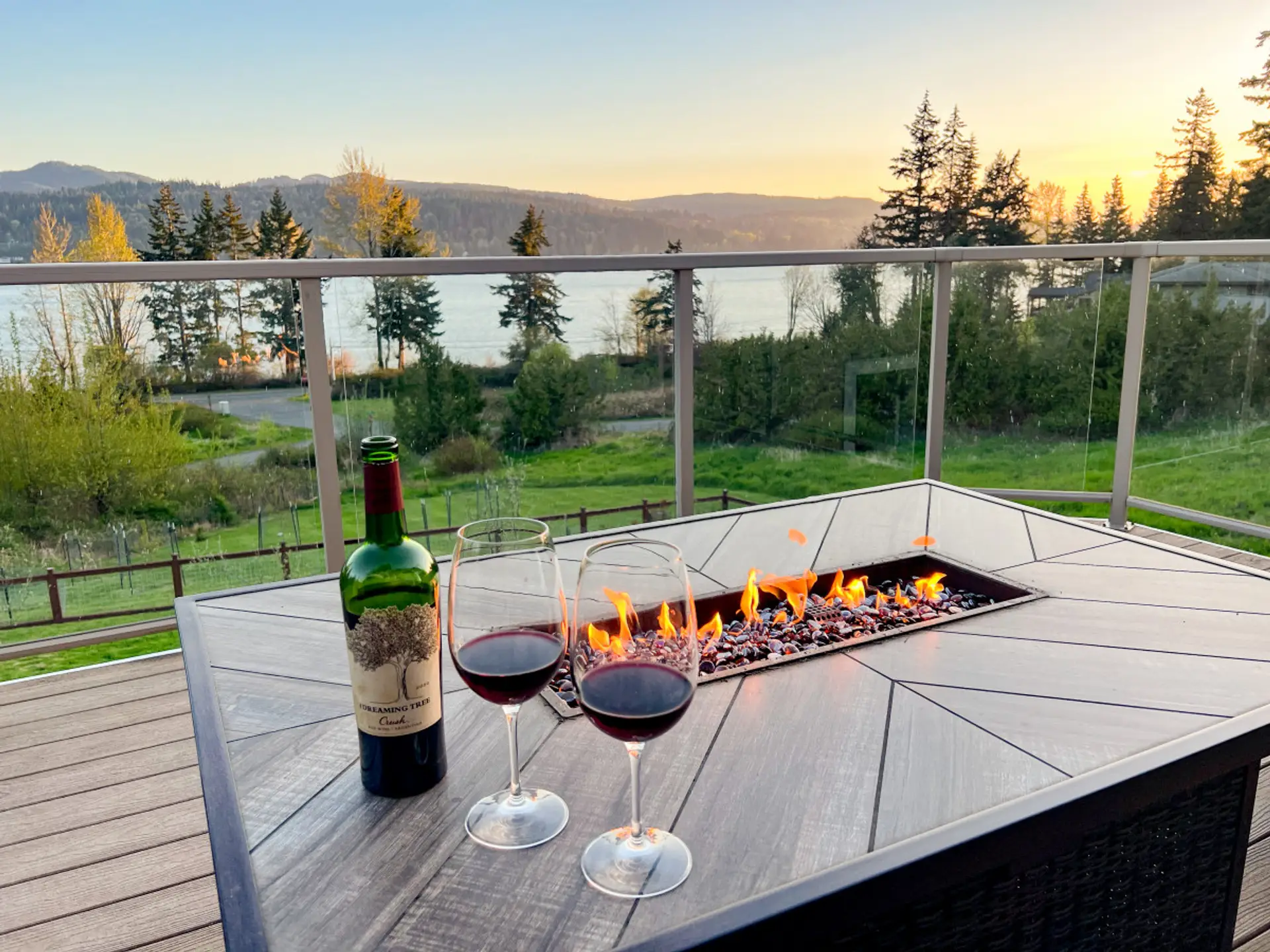 Watch sunset with the glowing embers of the fire table