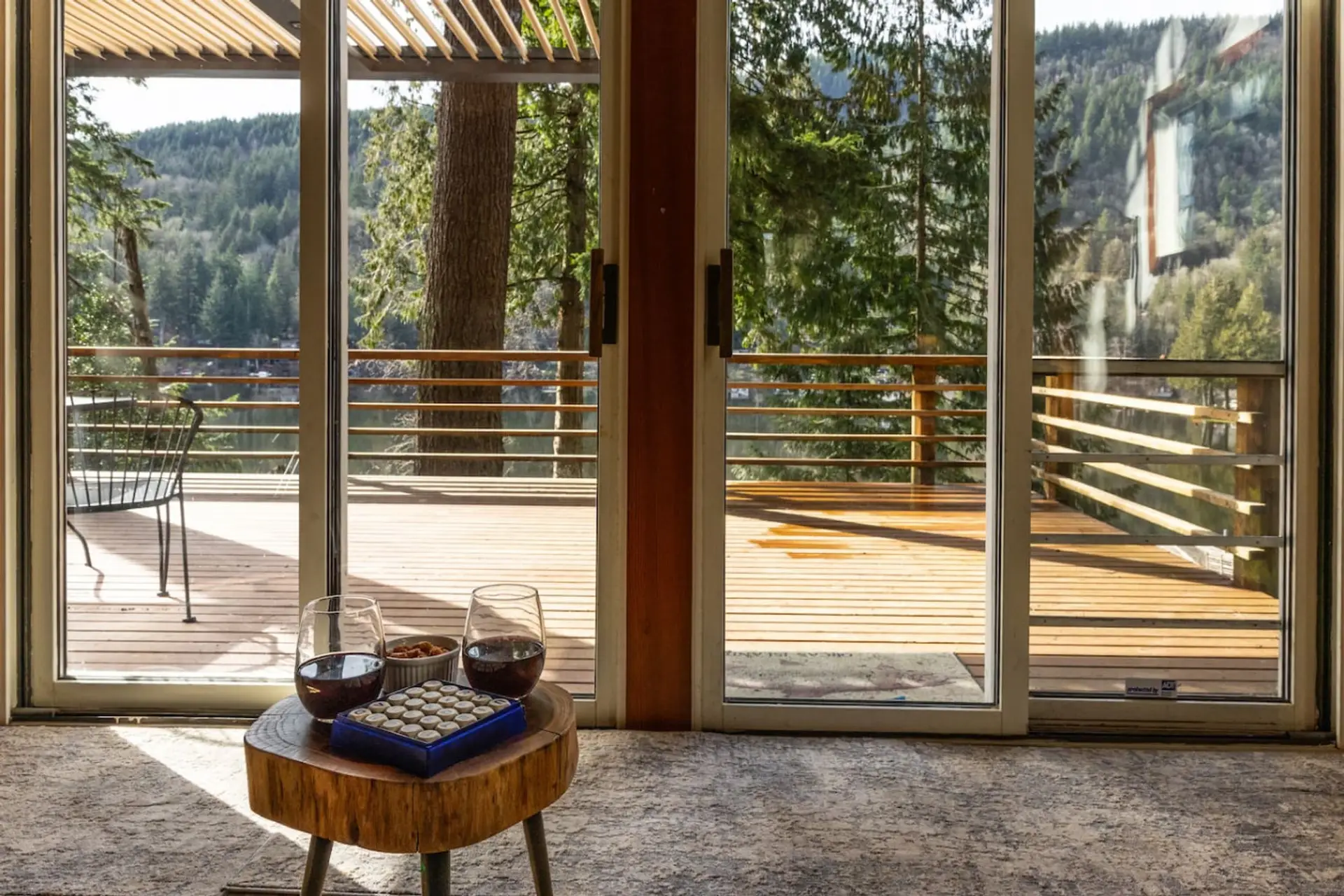 Sliding doors lead out to the large deck