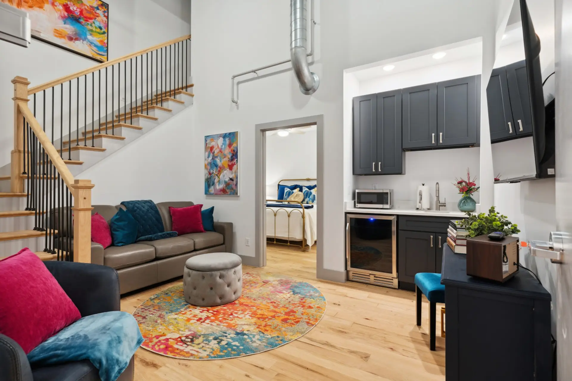 Welcome to Majestic Lofts 602! First floor - den, kitchenette and bedroom #1