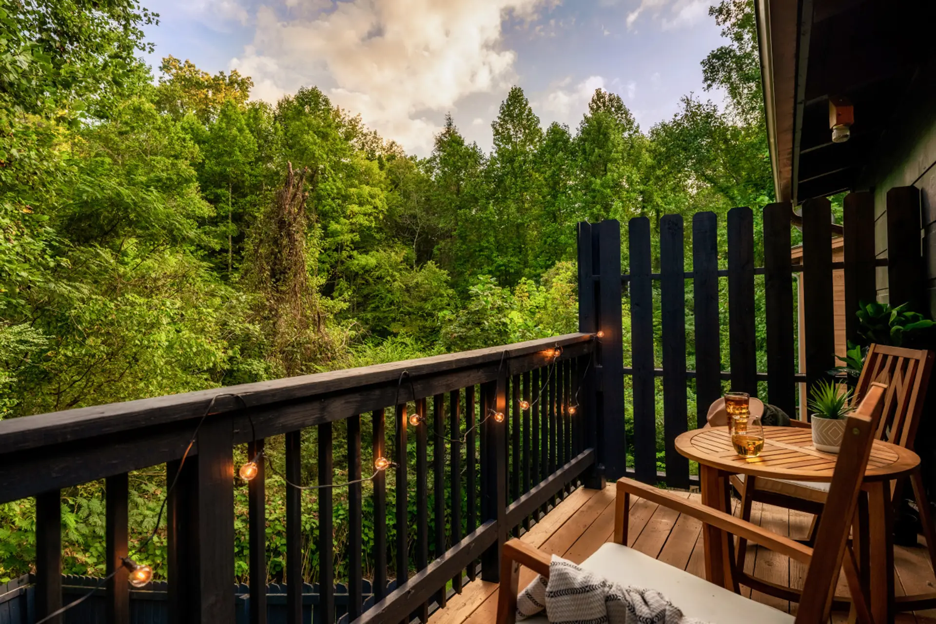 🌄 Breathtaking Balcony Views in Gatlinburg!  Wake up to stunning tree-lined views from this modern cabin's private balcony. Sip your morning coffee or unwind at sunset while soaking in the beauty of the Smoky Mountains. 🌅☕ Your perfect getaway starts he