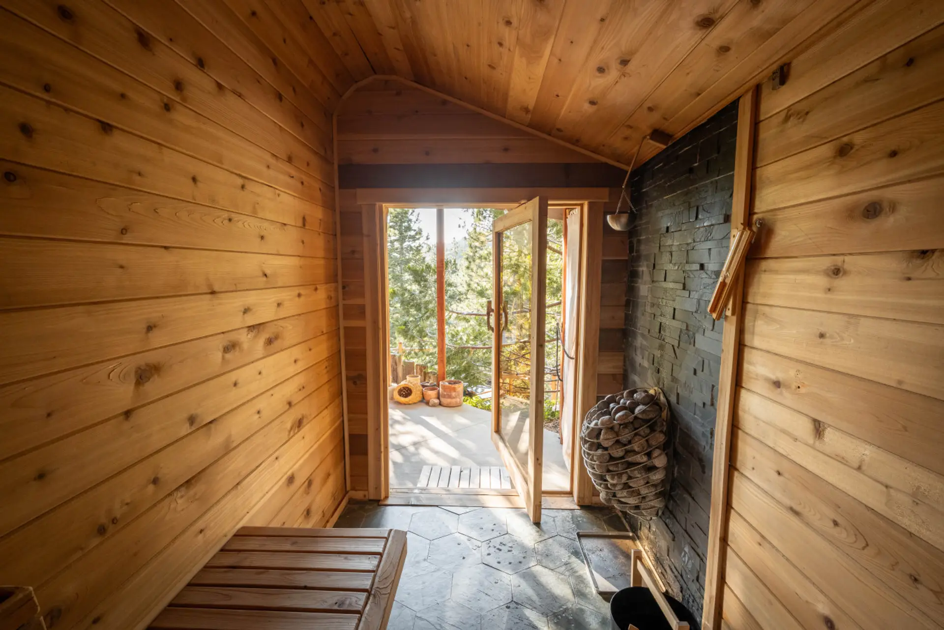 Entryway: Inviting wood accents in the sauna and fresh air set the scene for your mountain retreat!