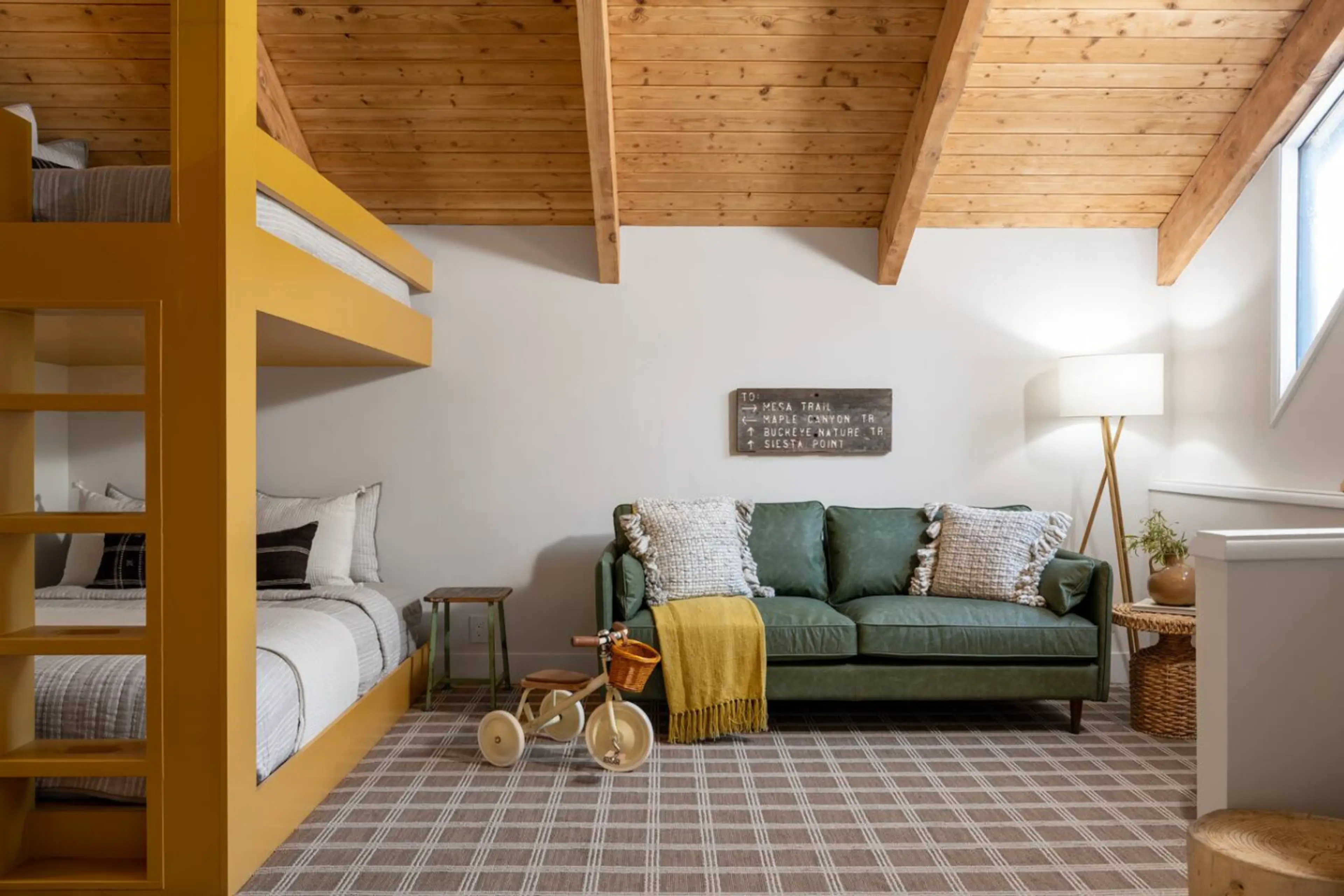 Bunk Room: Playful design with a fun bunk bed, vibrant decor, and cozy lounging spot awaits you!