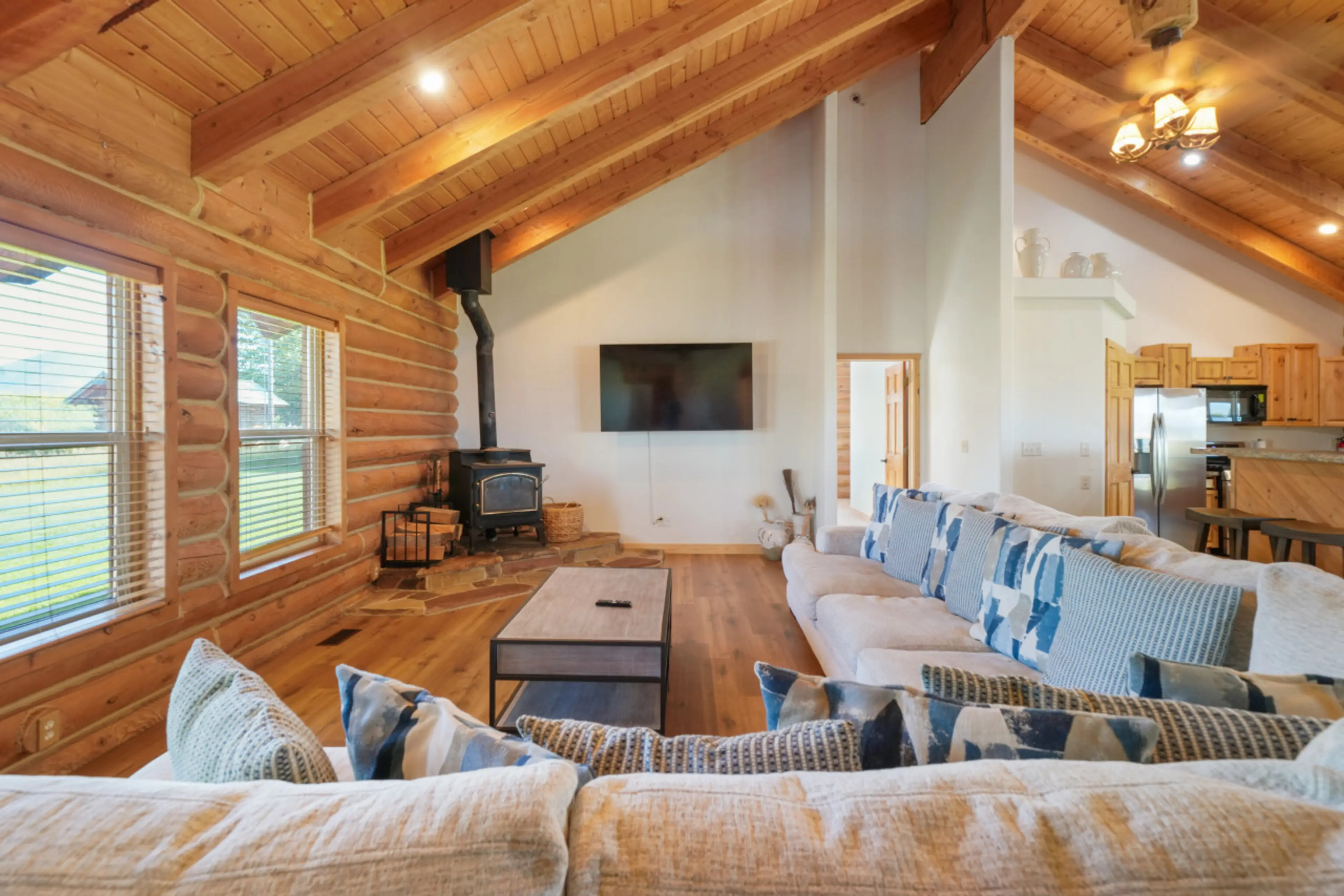 Large sectional couch - 70in TV, wood-burning stove