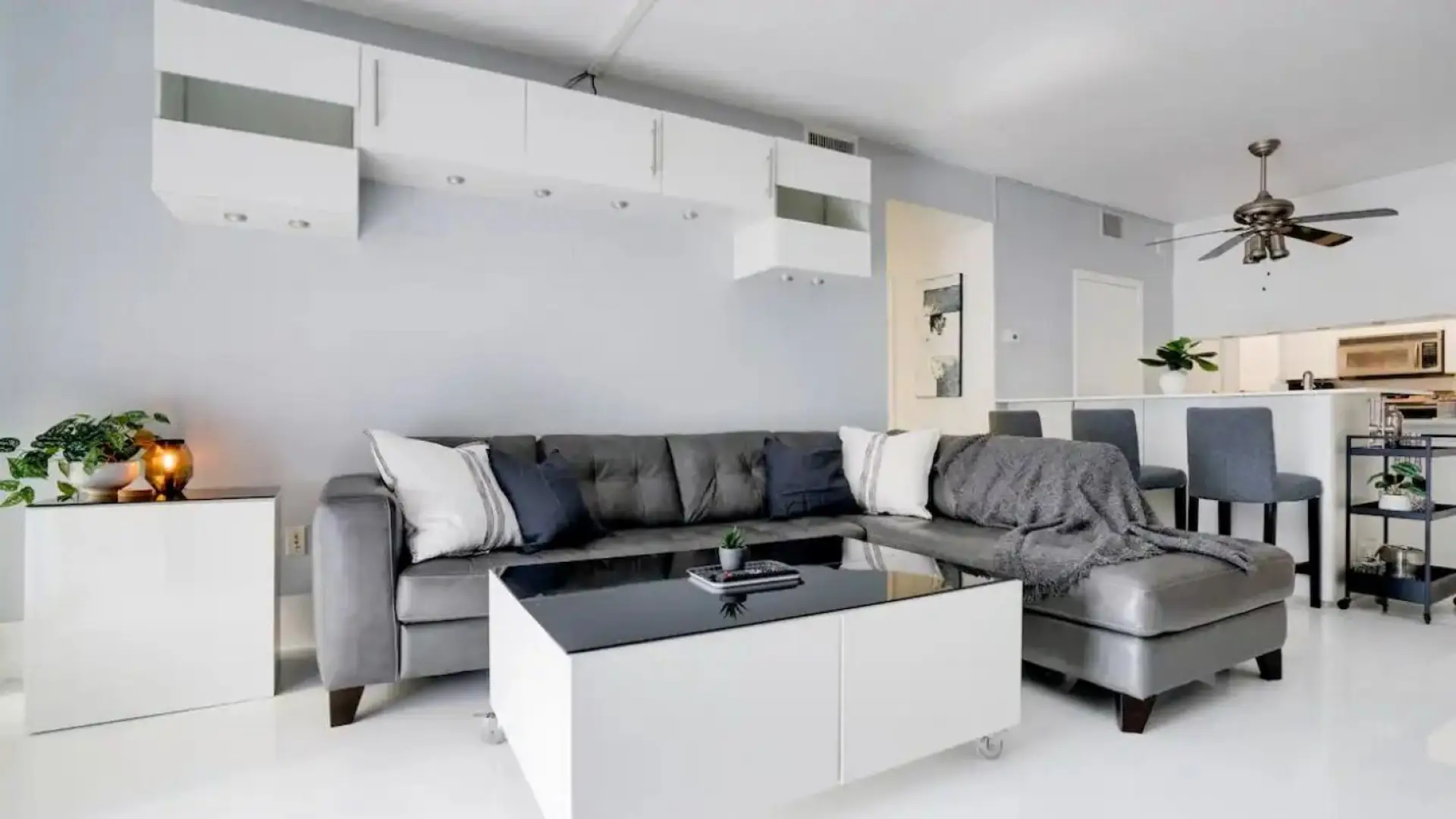 Bright and spacious living room equipped with full size couch
