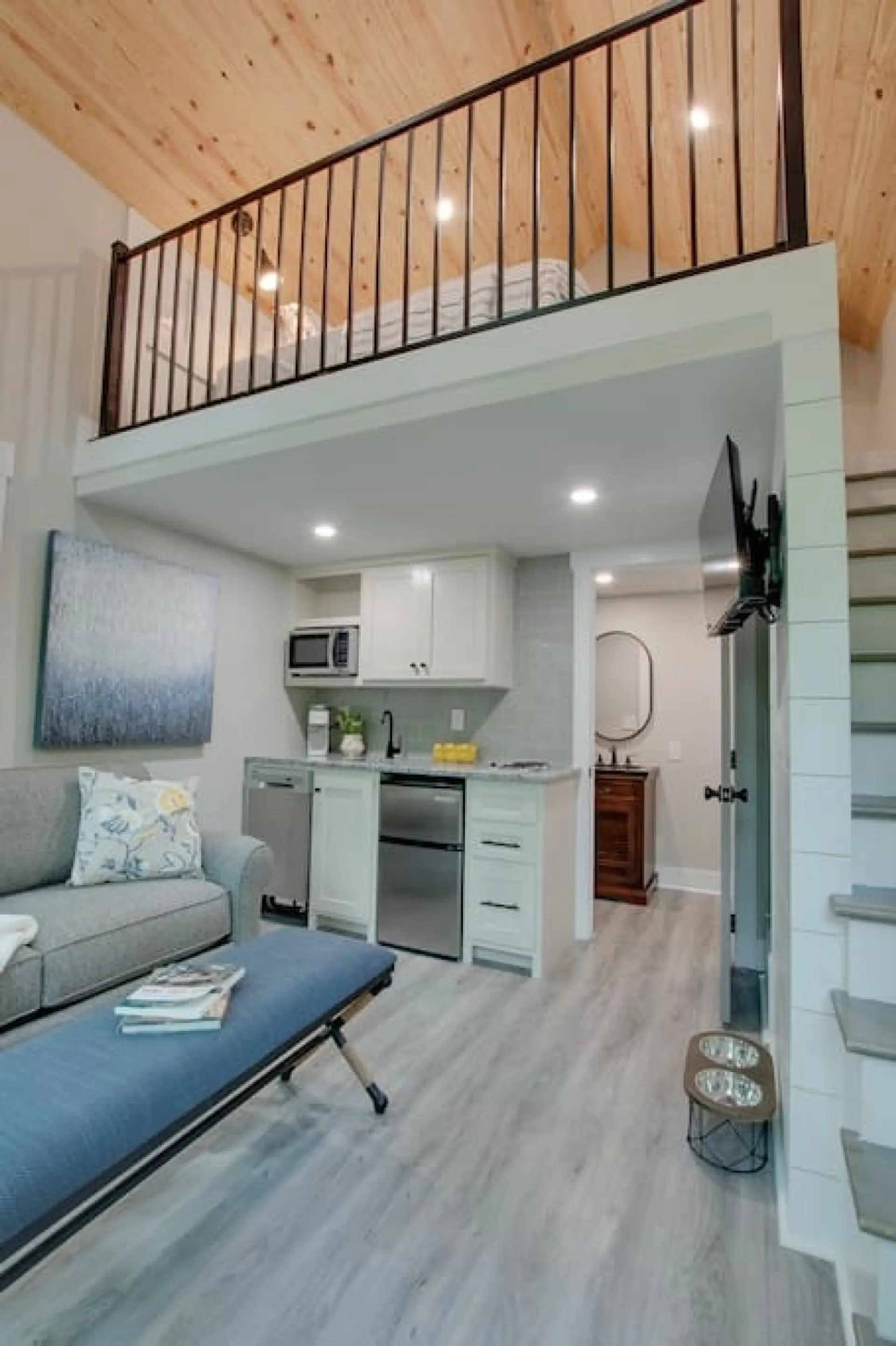 Luxury treehouse with elevated forest views, perfect for a romantic getaway or adventure in nature. Includes a private deck and access to hiking trails.