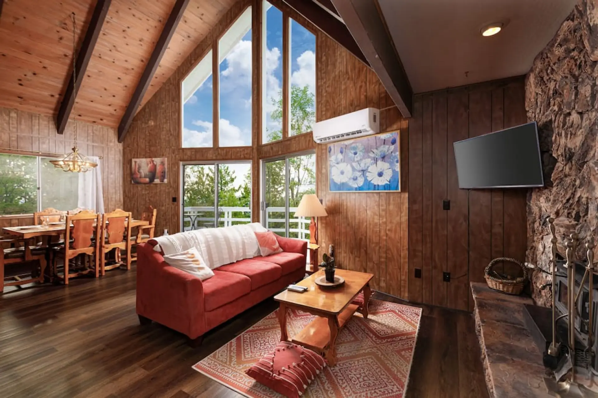 Living Room with A Frame window with stunning views