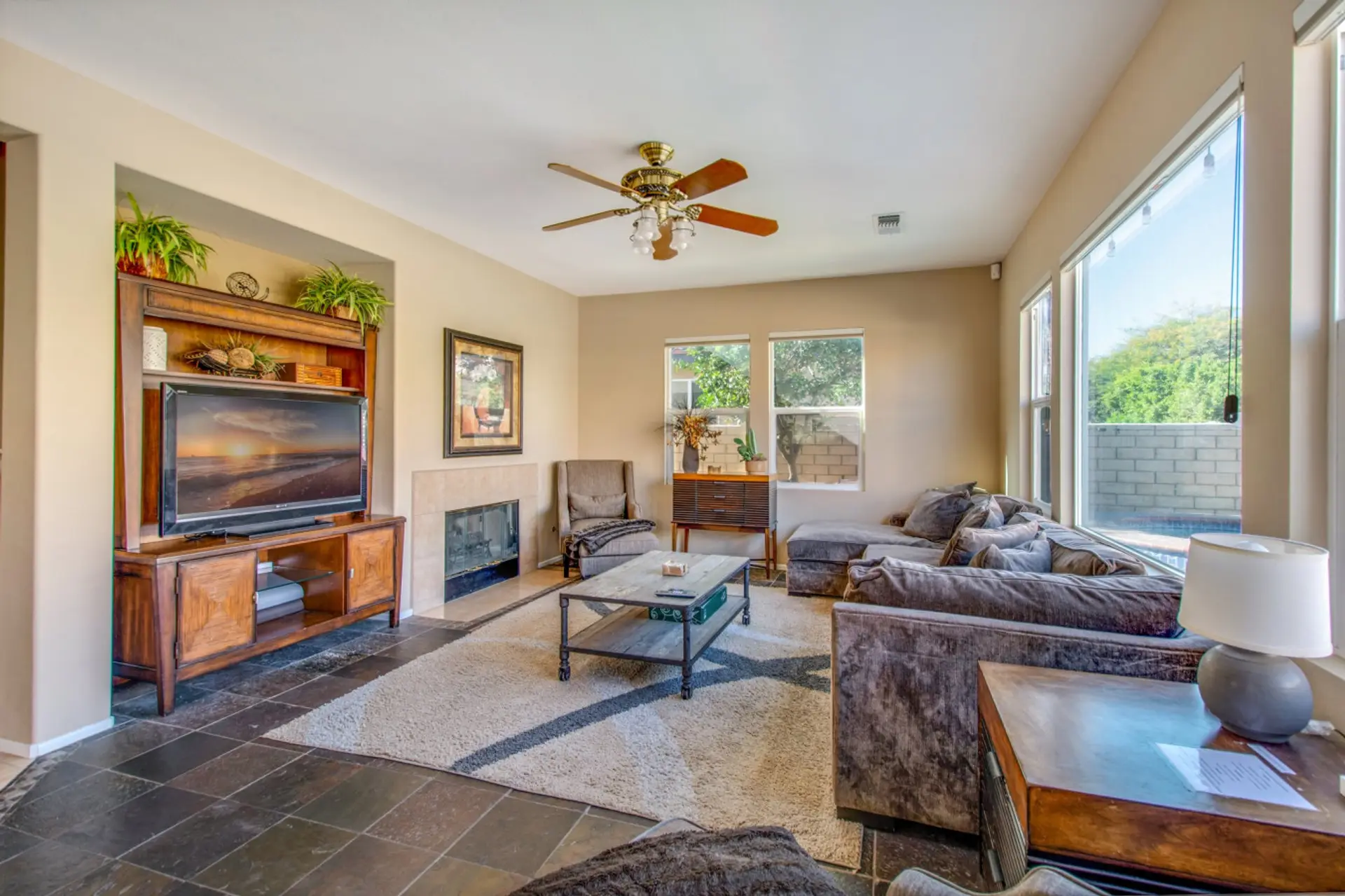 Living room with comfortable seating and a tv and fireplace