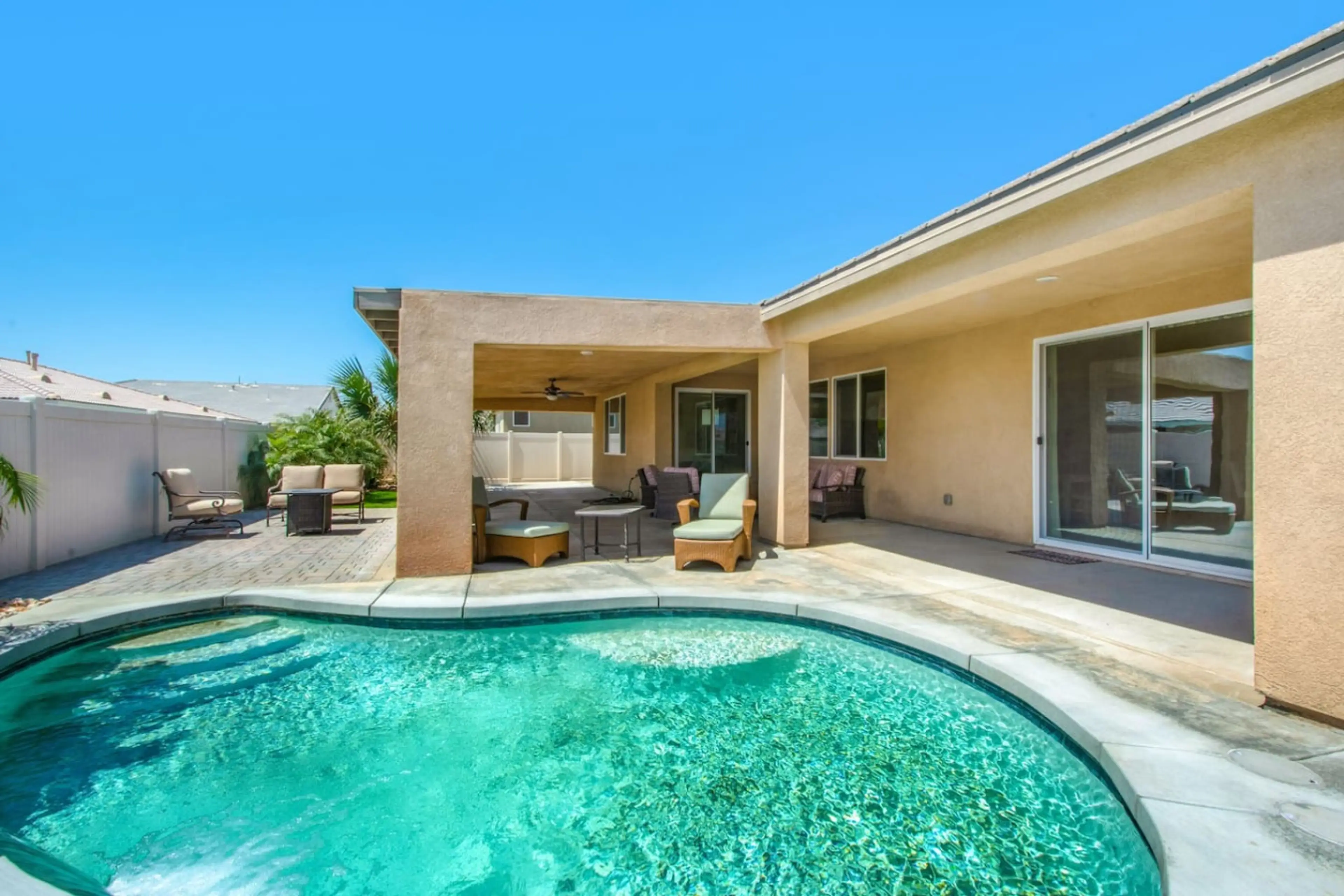 Soak up the sun or take a refreshing dip in your sparkling private pool.