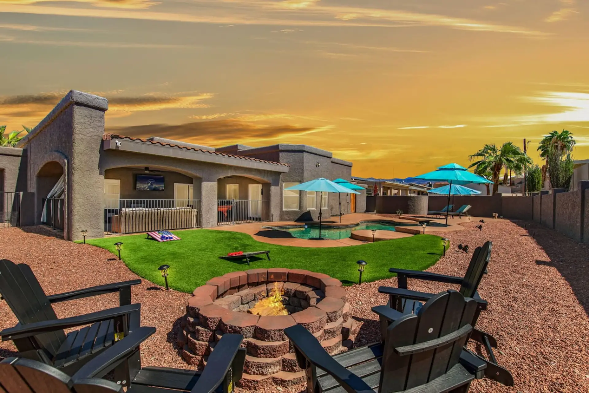 Gather around the wood-burning fire pit at The Golden Hour Getaway for cozy evenings
