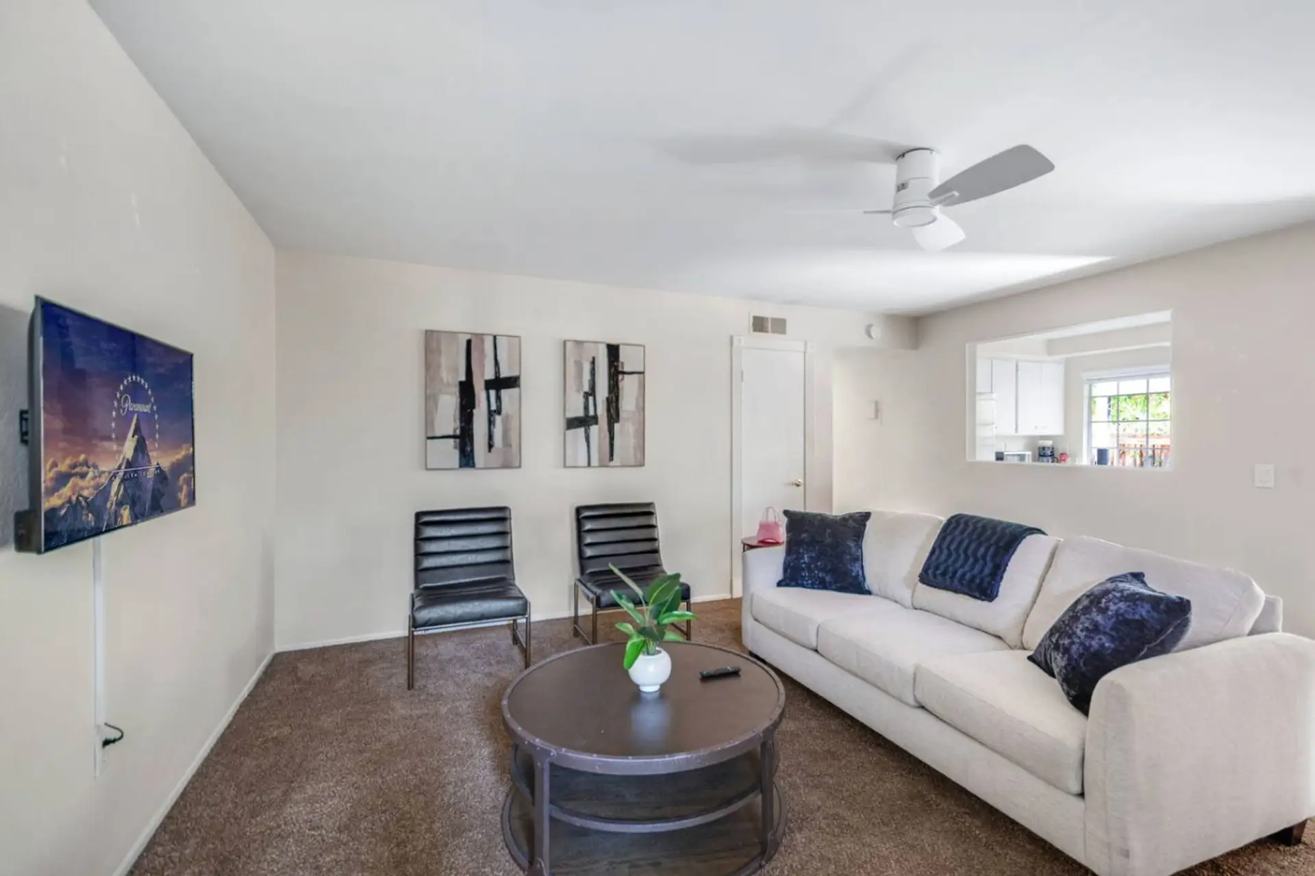 Bright and cozy living space with comfy seating and modern décor.