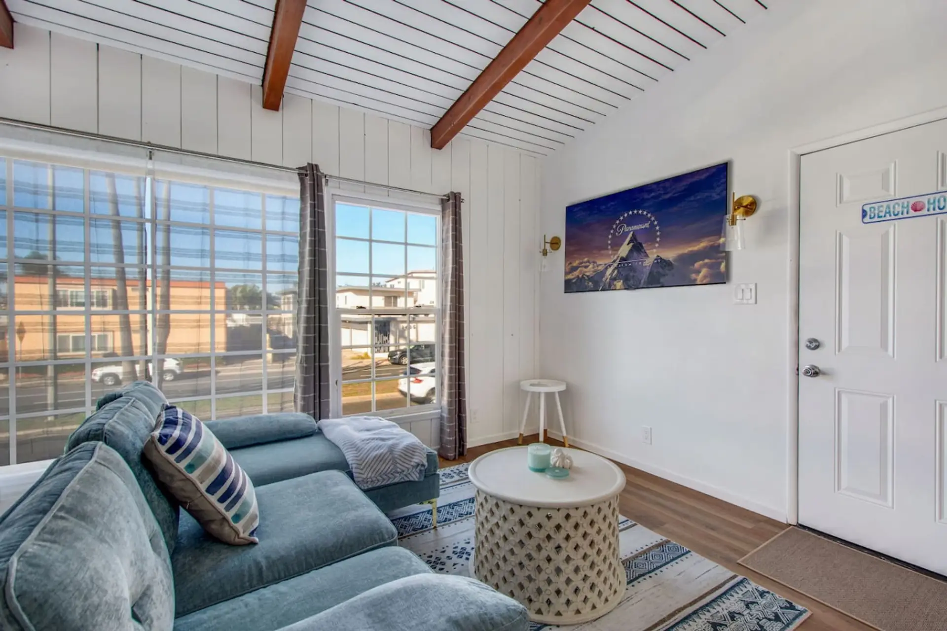 Relax in the bright living area featuring cozy seating and natural light.