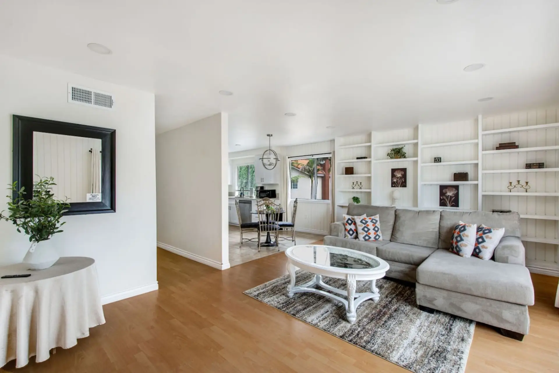 Comfortable living room with cozy couch seating and Smart TV
