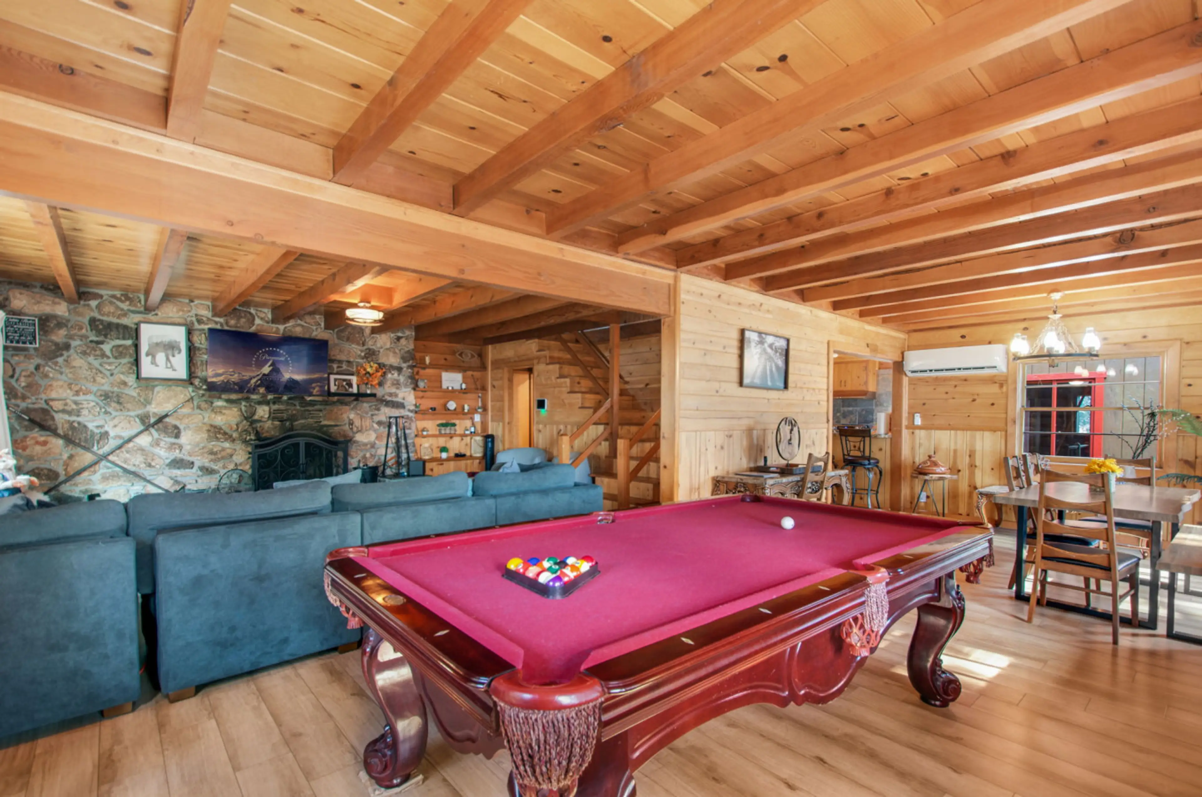 Fun game room with pool table and cozy seating for relaxing nights in.