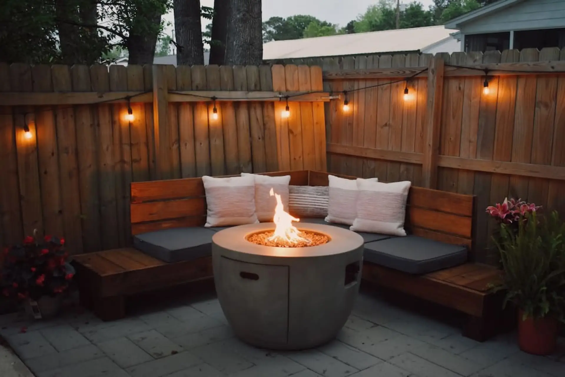 Your own private escape with string lights, a cozy fire pit, and built-in seating - just 15 minutes from downtown Charleston but feels like a world away