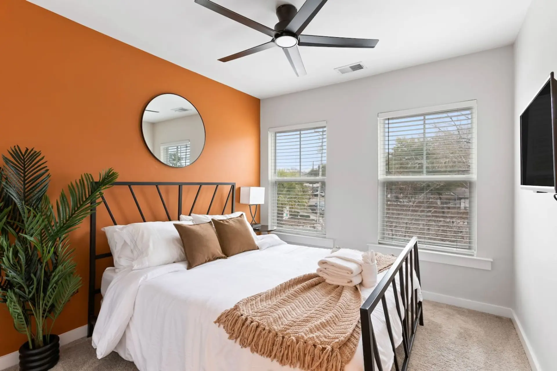 Wake up to natural light and that Charleston breeze from your ceiling fan in a bedroom that blends modern style with real comfort