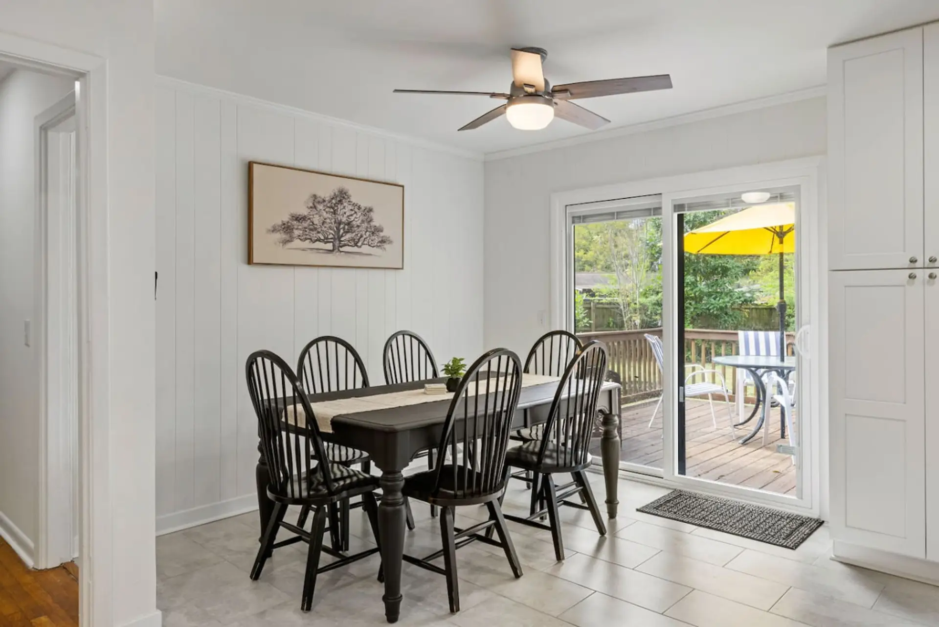 Plenty of room for everyone to gather for meals, with easy access to the deck when someone wants to take the party outside