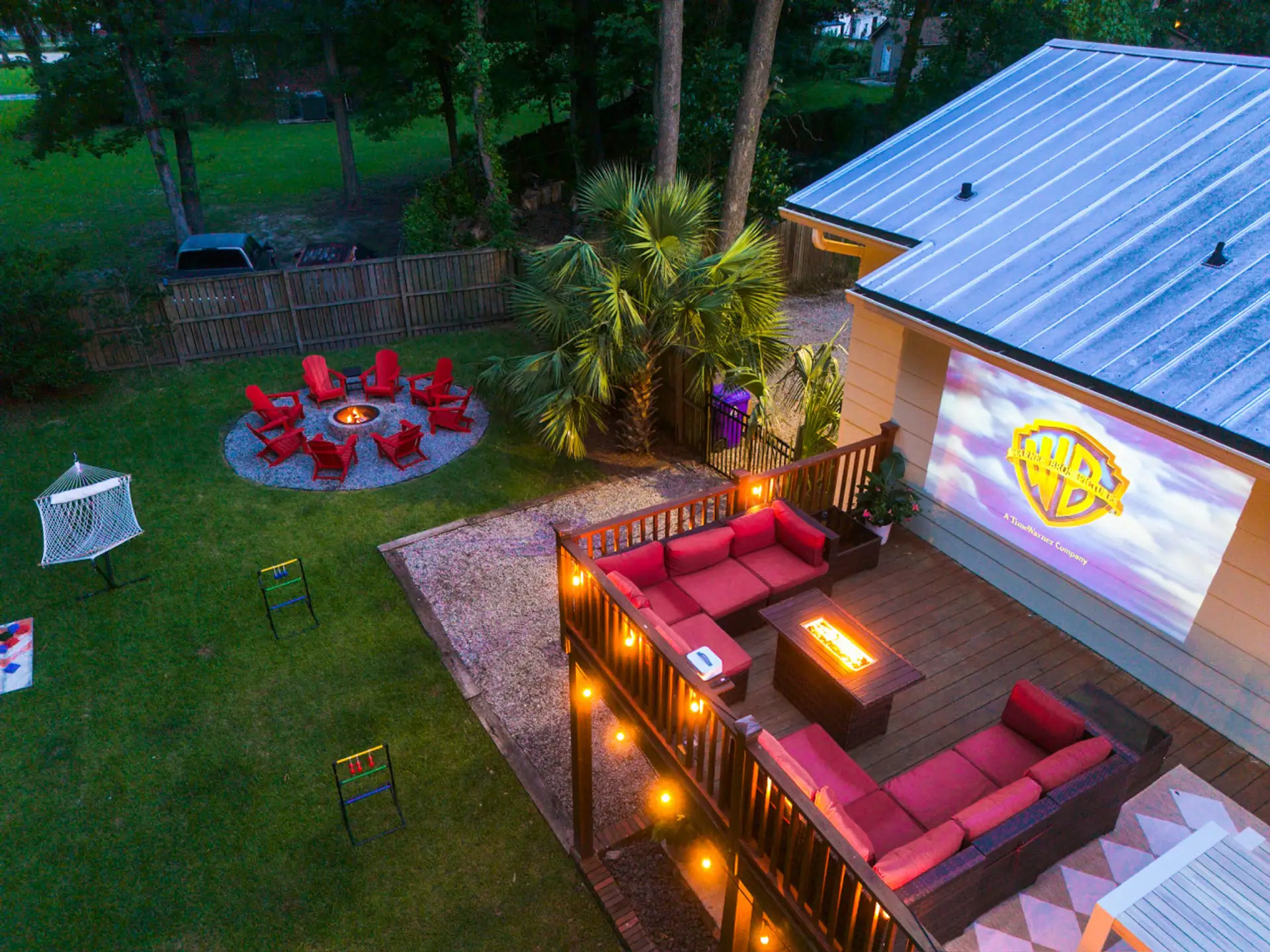 Cozy up on the movie deck with a fire table and enjoy your own private outdoor theater - complete with lounge seating, twinkling lights, and that hammock you've been eyeing