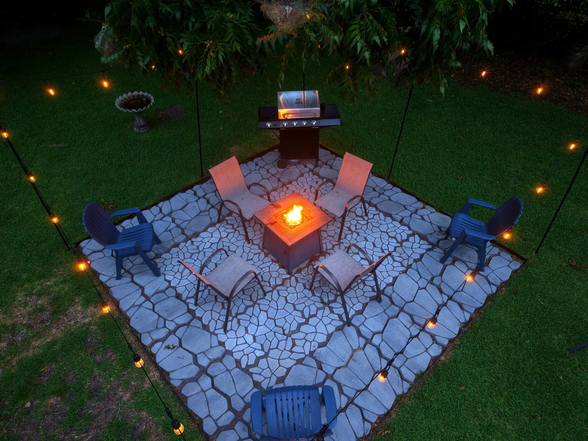 Gather around the firepit with string lights overhead for those perfect Charleston evenings, then fire up the grill when someone mentions they're hungry