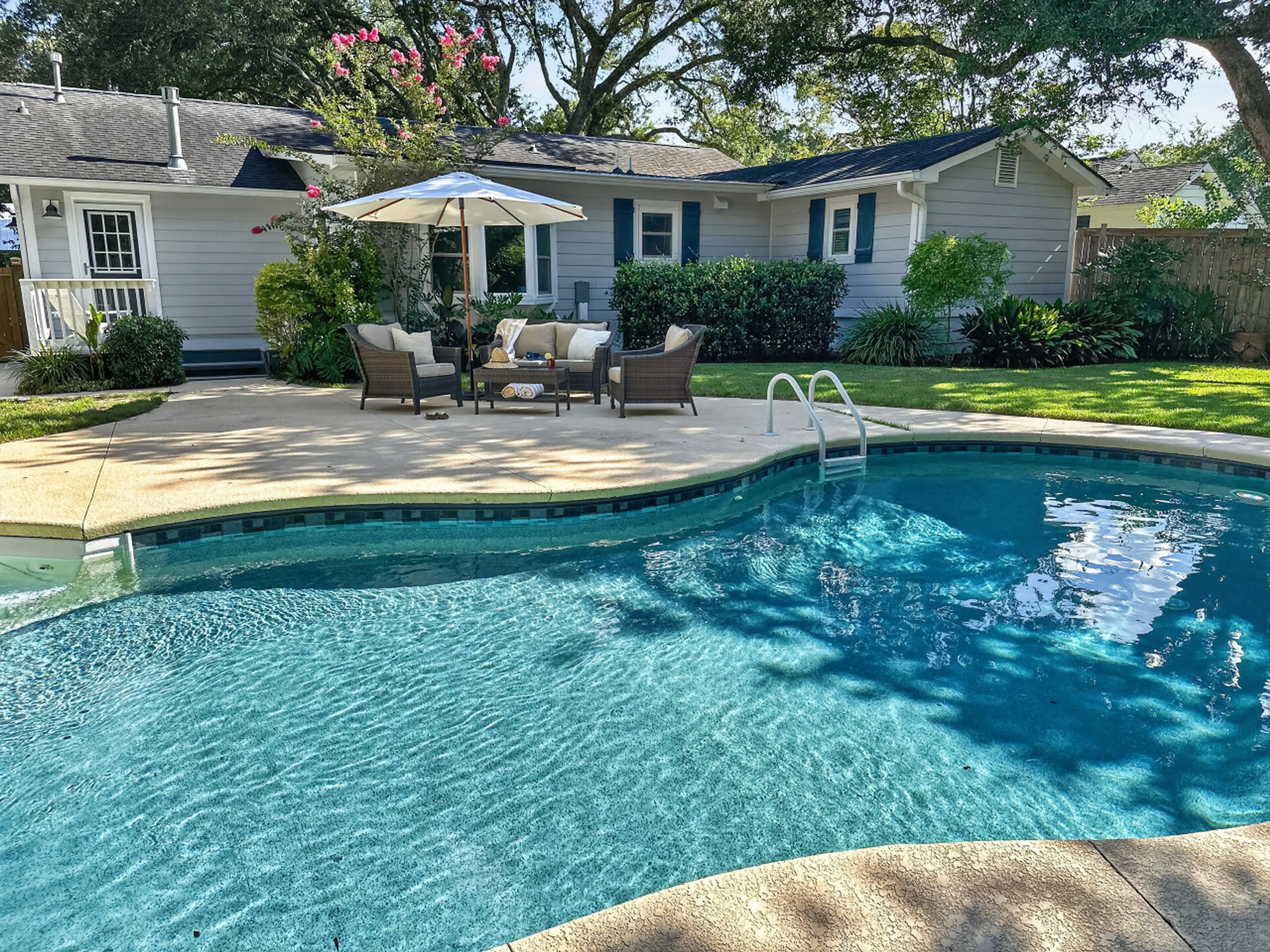 Your own private pool under the Charleston oaks - grab a book and claim a lounge chair for the afternoon