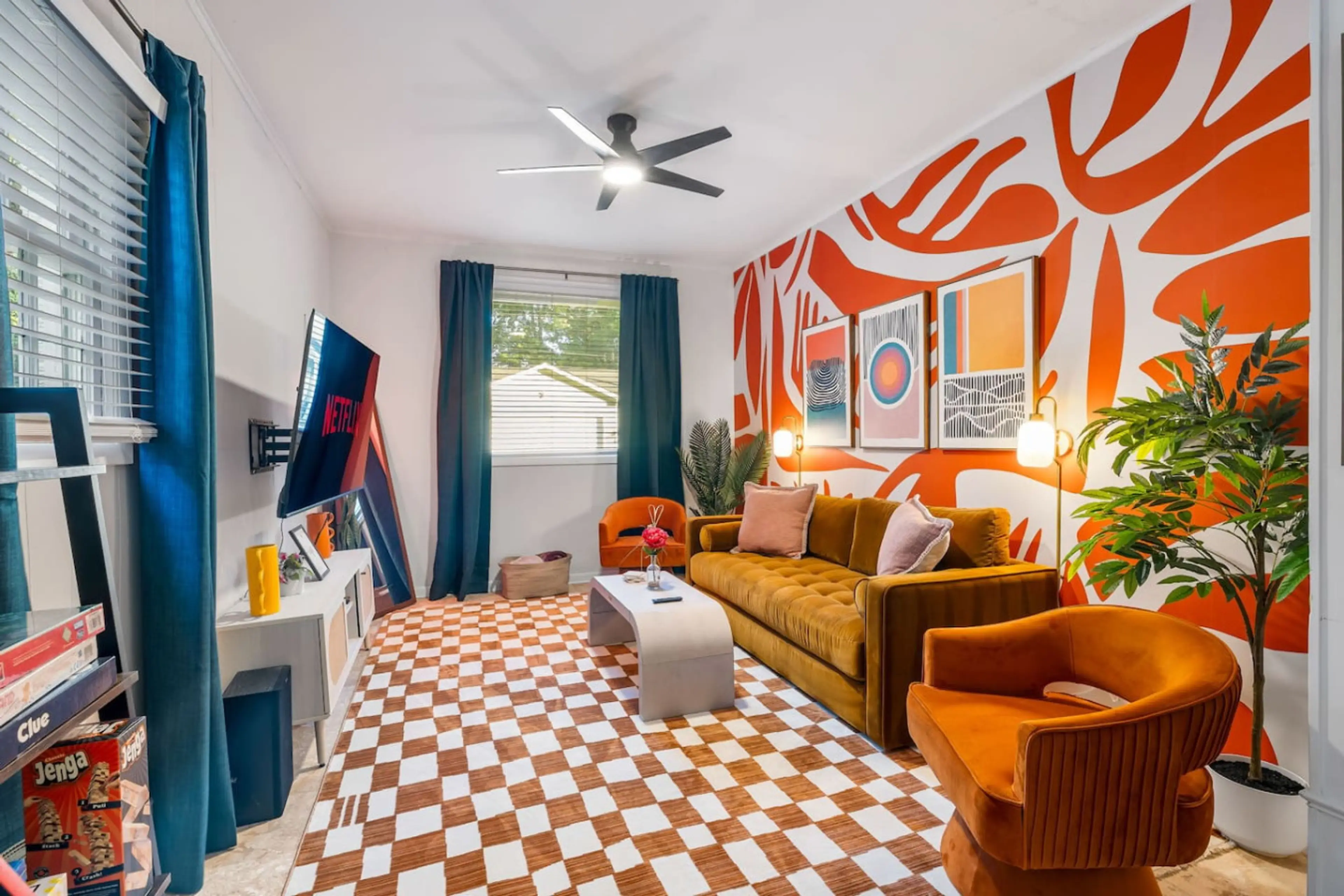 Kick back in your own technicolor hideaway where bold art meets retro vibes and board games are always within reach