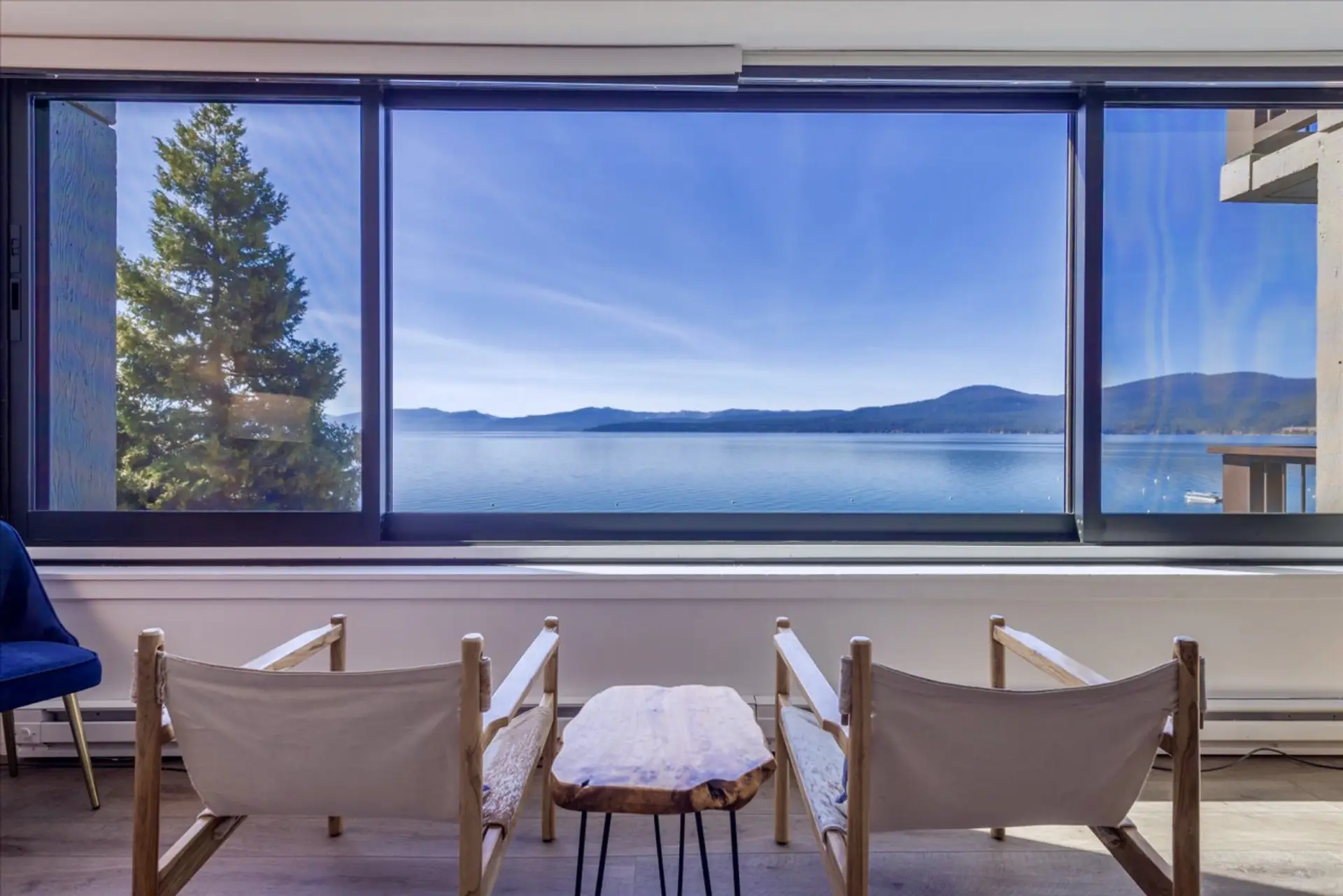 Spectacular lake views await from this stylish retreat—your relaxation zone!