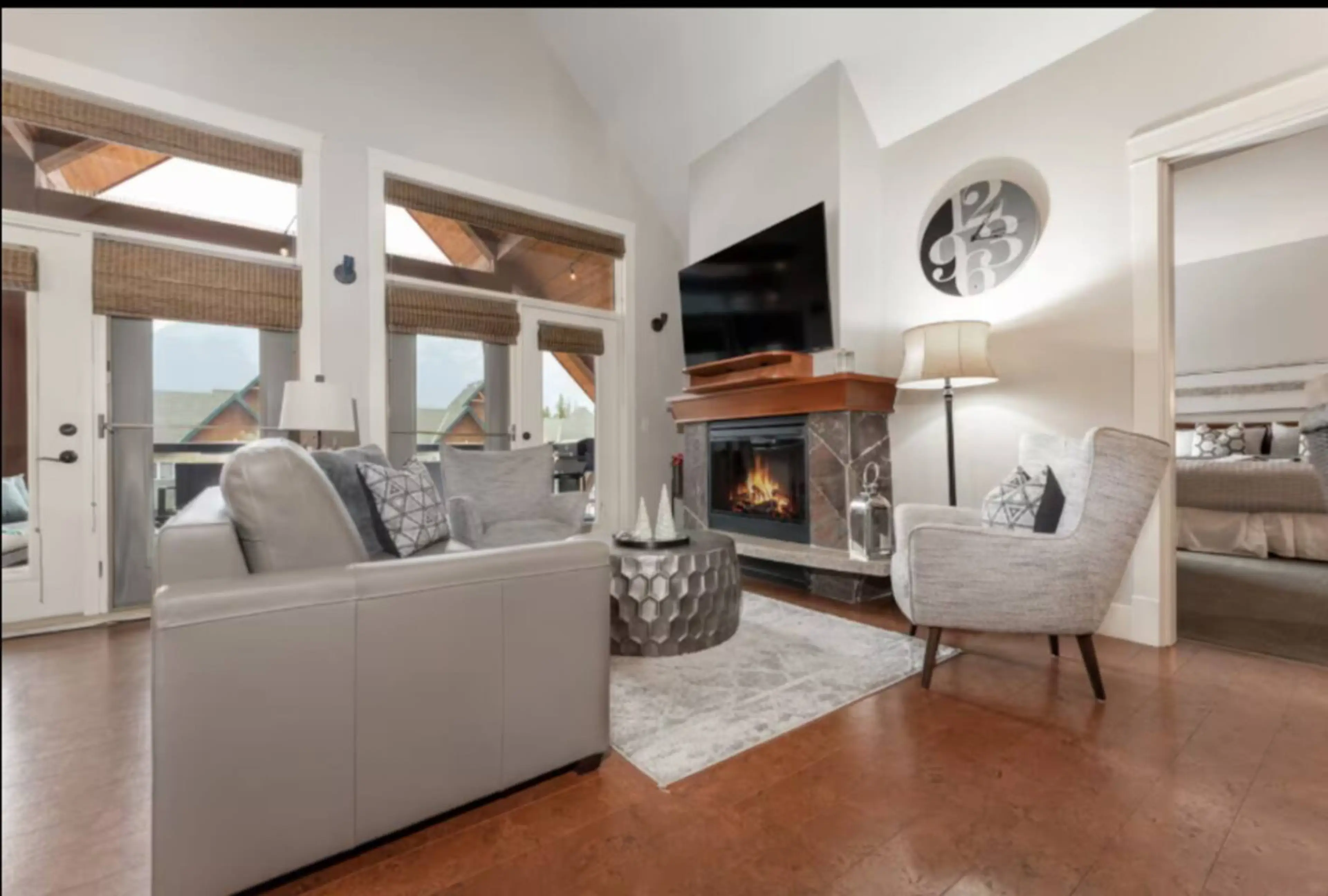 Find your peace where soaring ceilings meet fireside warmth.