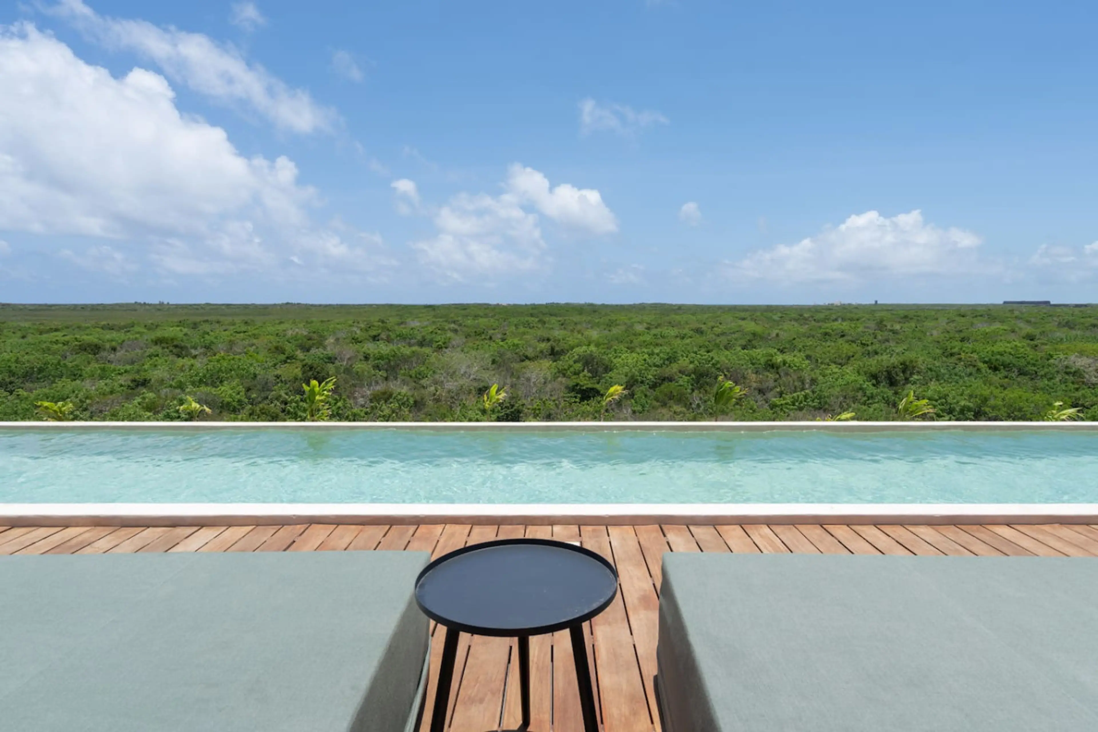 Roof top infinity pool with lounges