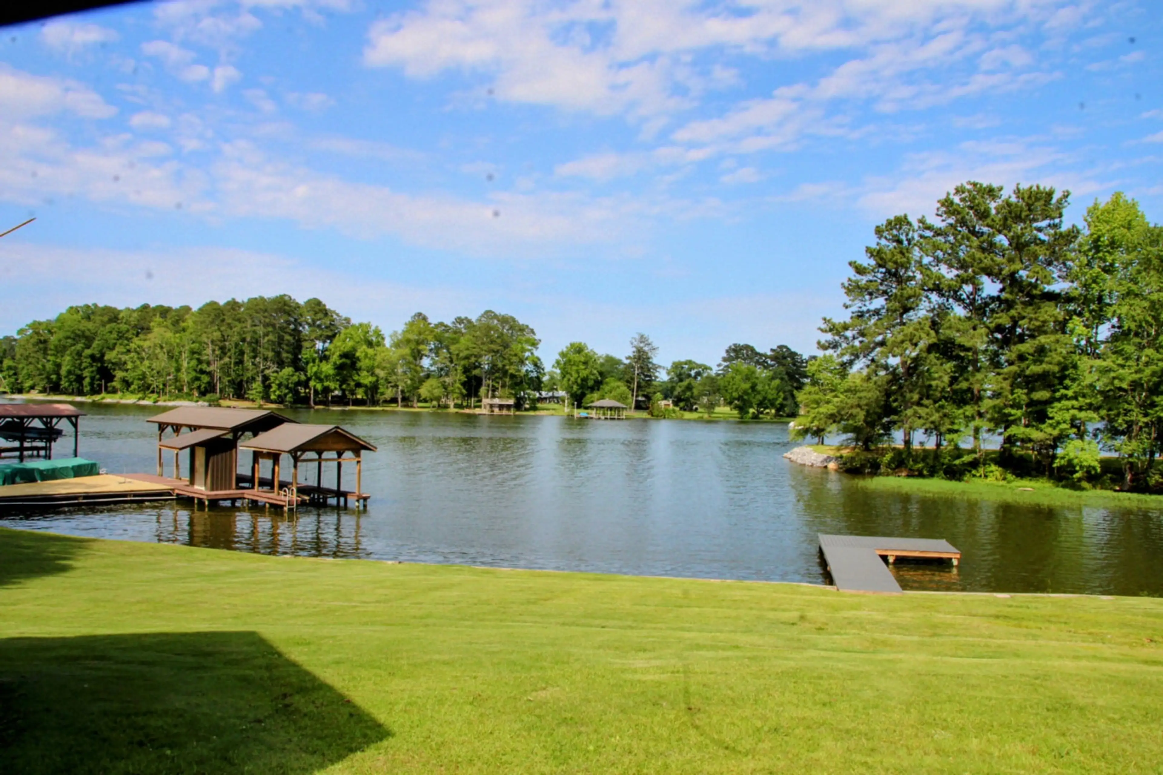 Waterfront view of Weiss Lake and private pier from the property