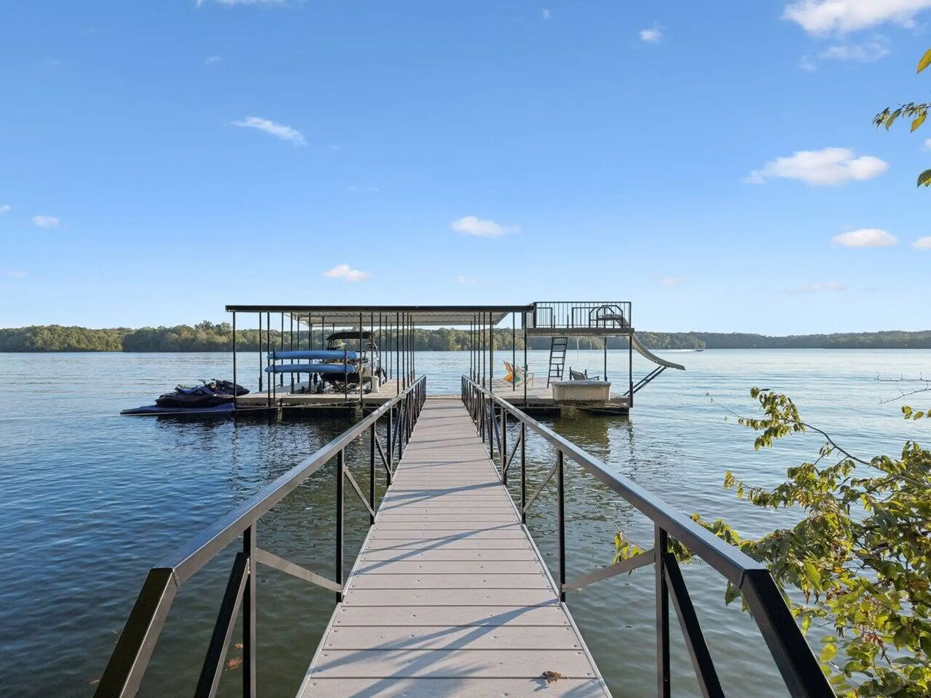 Enjoy your private dock with a slide, 6 kayaks, lily pad,  and boat slip