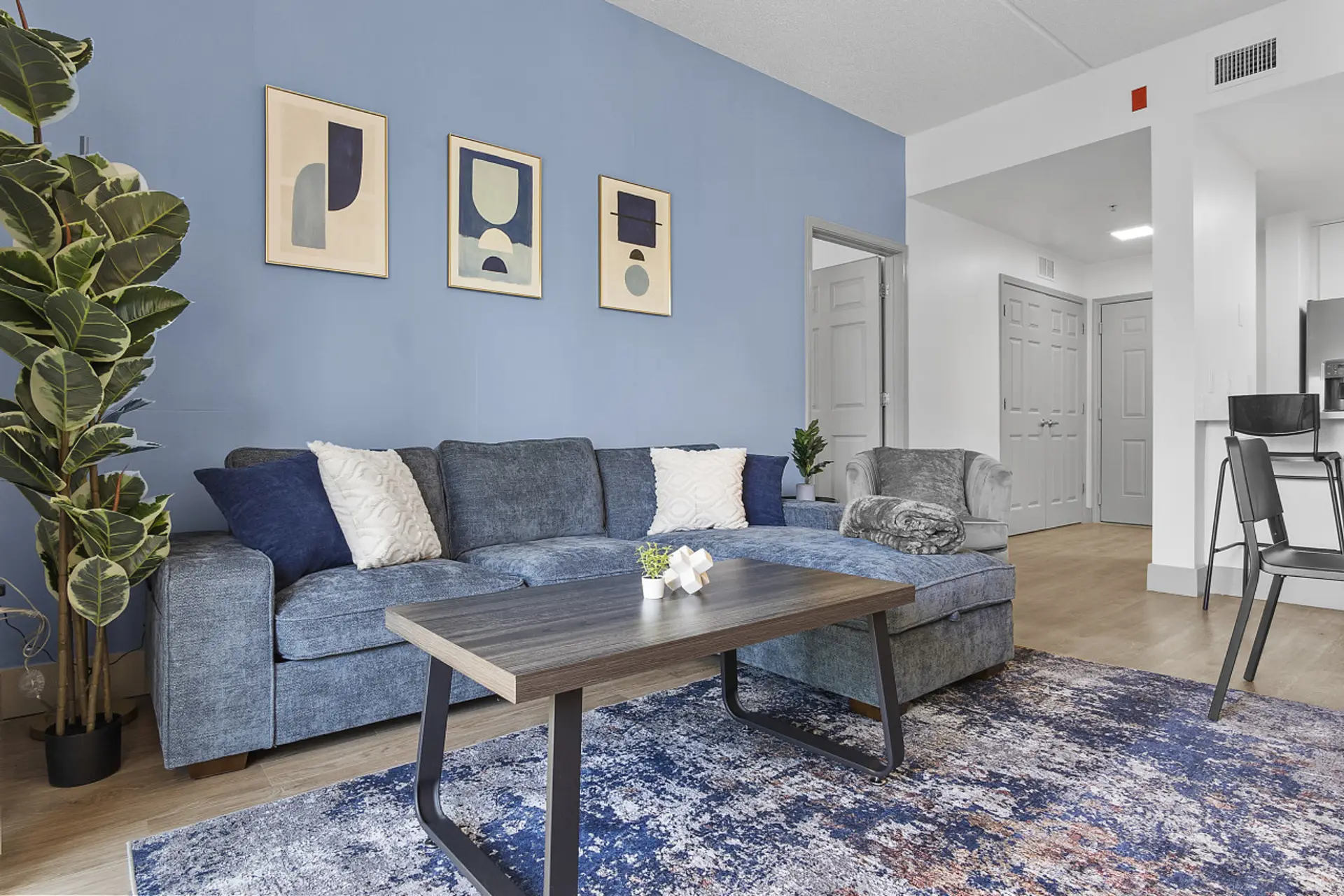 Unwind in the spacious living area complete with a comfy couch to relax after a long day exploring the city!