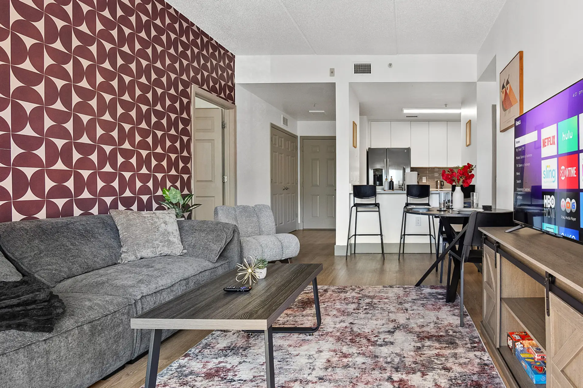 Gorgeous 3 bedroom, 2 bathroom apartment complete with a full kitchen, Living Area, AC, desk, TV, washer/dryer, balcony, & much more!