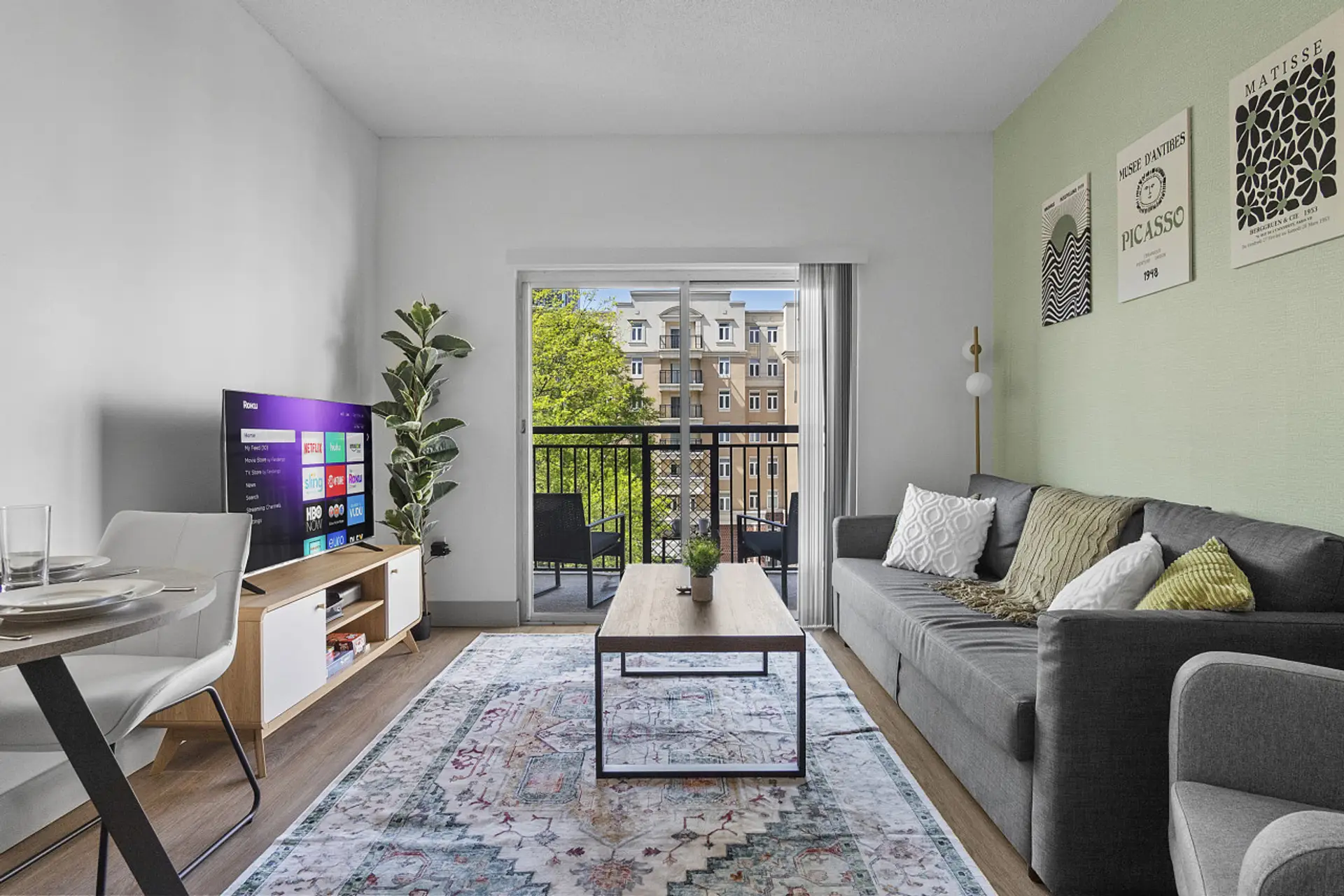 Delightful 4 bedroom, 2 bathroom apartment complete with a full kitchen, Living Area, AC, desk, TV, washer/dryer, balcony, & much more!