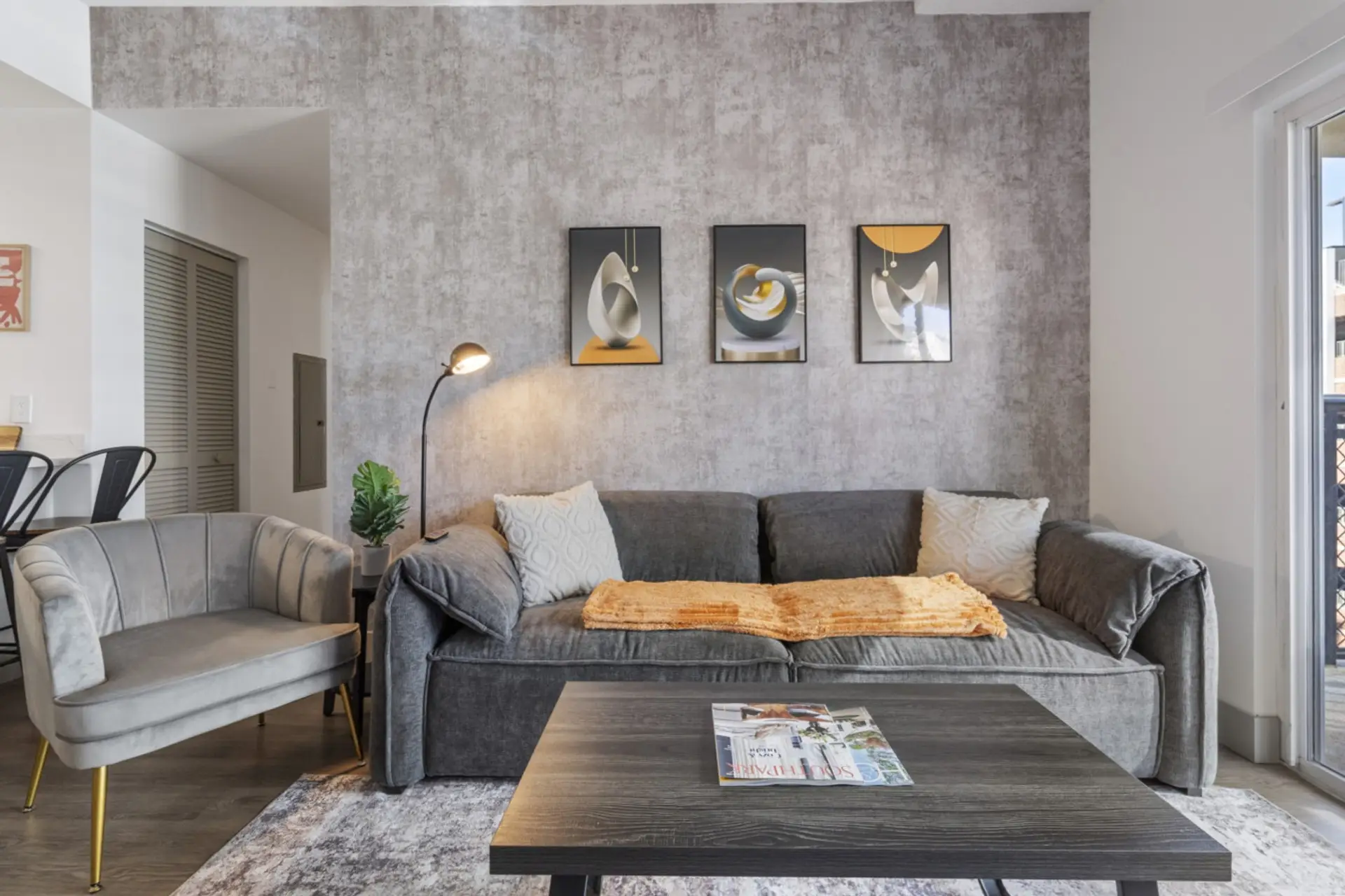 Unwind in the spacious living area complete with a comfy couch to relax after a long day exploring the city!