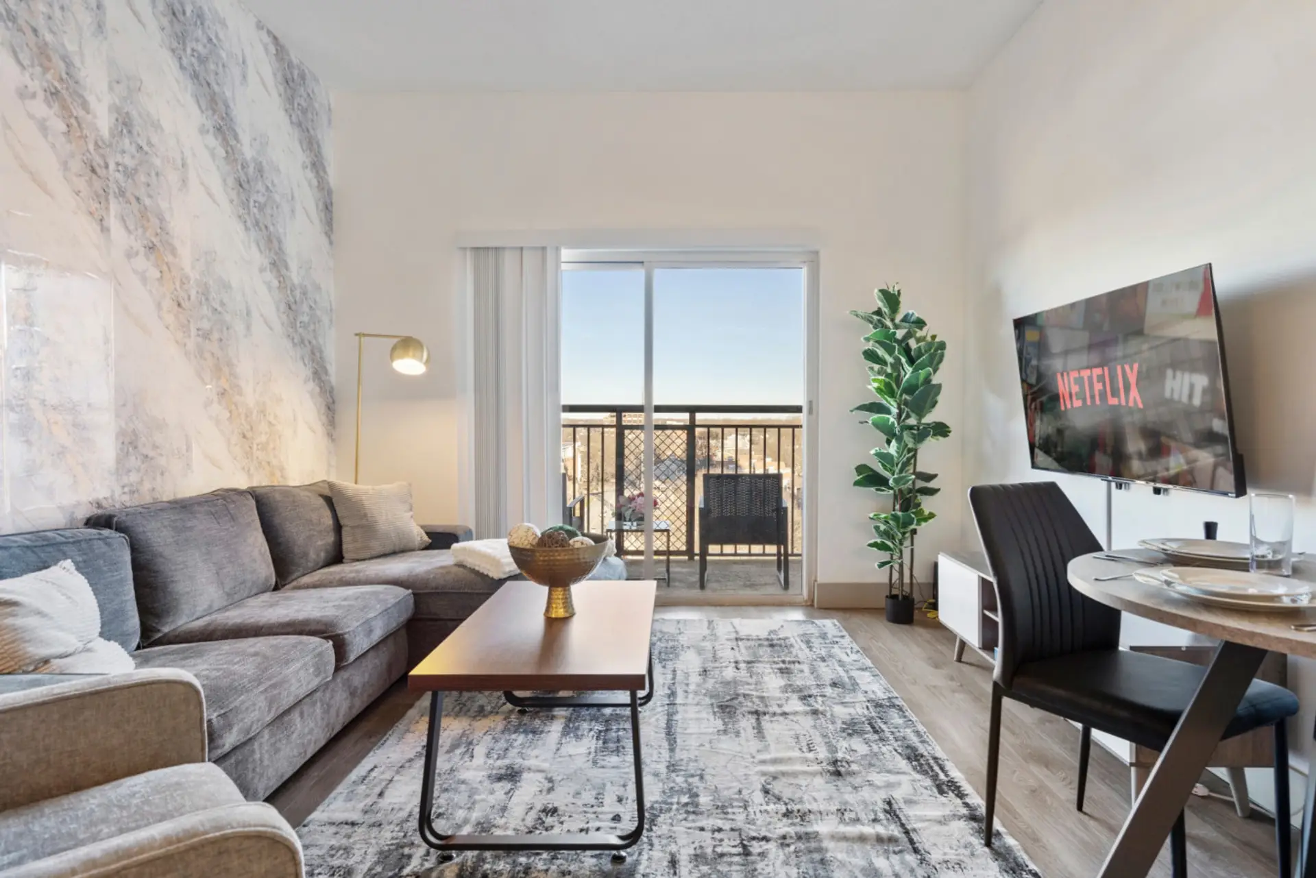 Cozy 3 bedroom, 2 bathroom apartment complete with a full kitchen, Living Area, AC, desk, TV, washer/dryer, balcony, & much more!