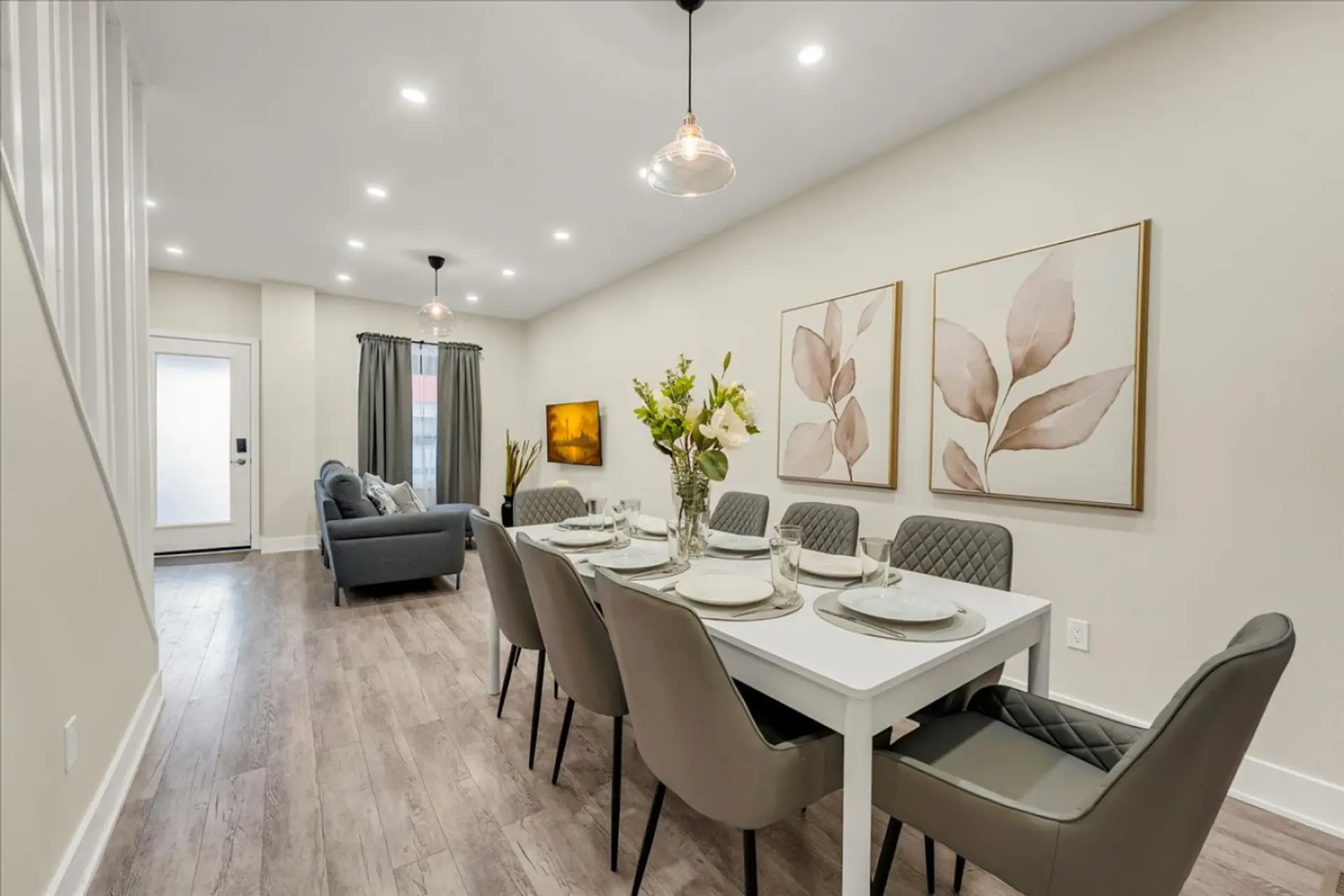 Enjoy home-cooked meals at our spacious dining table, beautifully lit and designed for meaningful conversation.