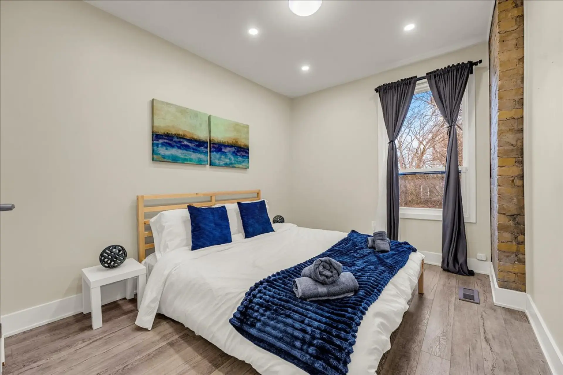 Sink into luxury with high-quality linens and a peaceful atmosphere. Features views of the surrounding greenery.