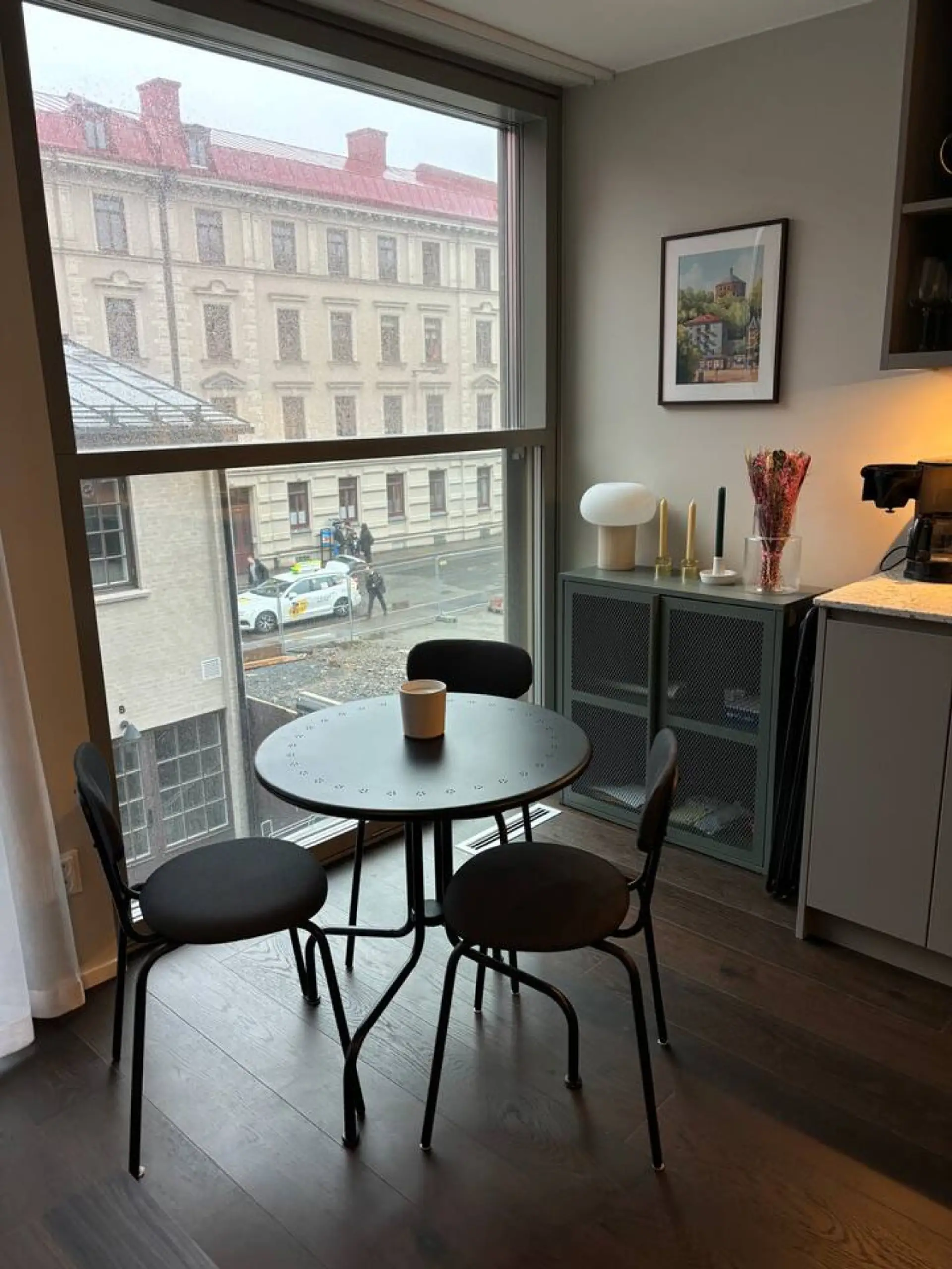 Dining nook by the window with city view