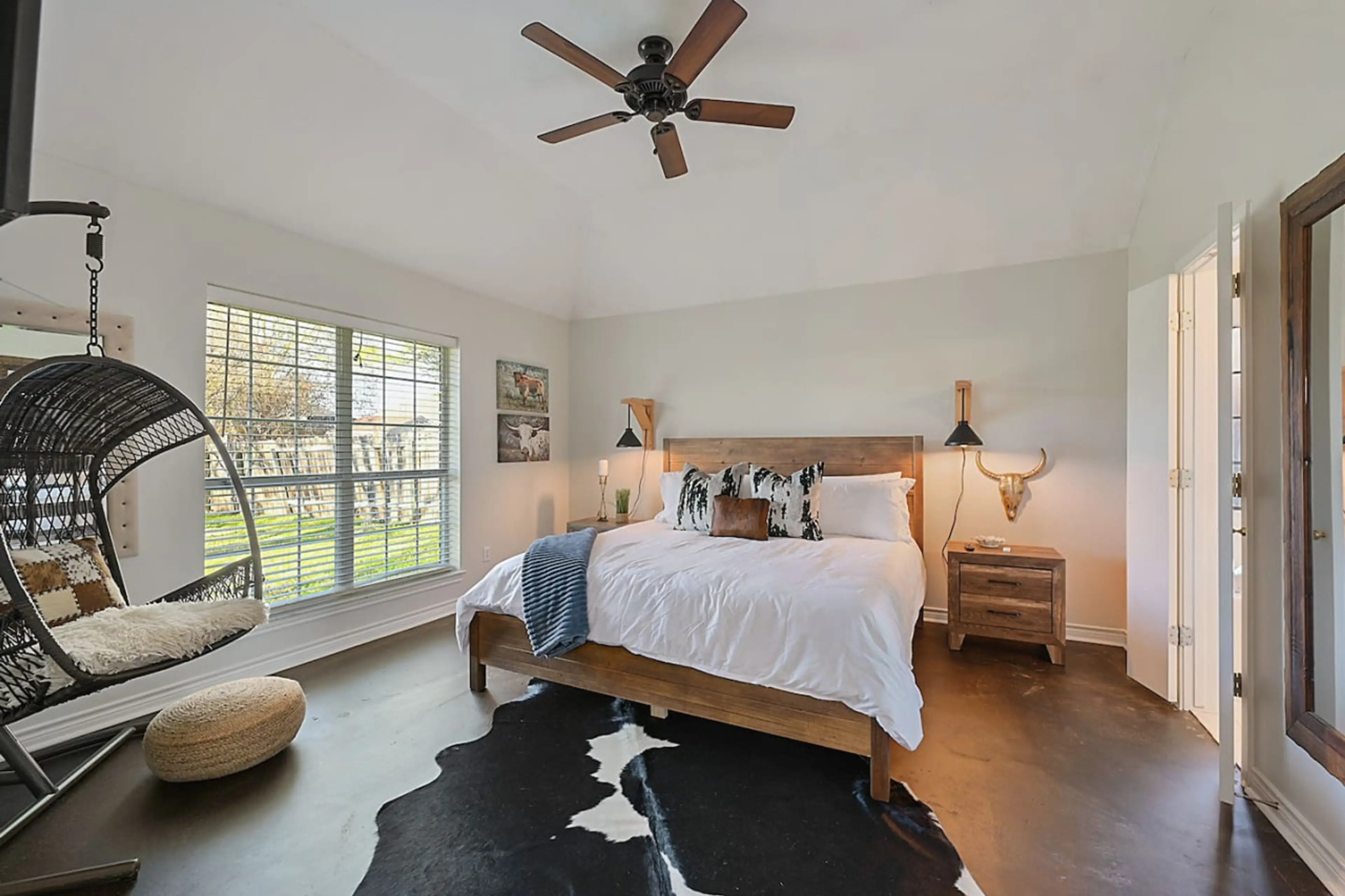 The primary bedroom offers a comfy king bed.