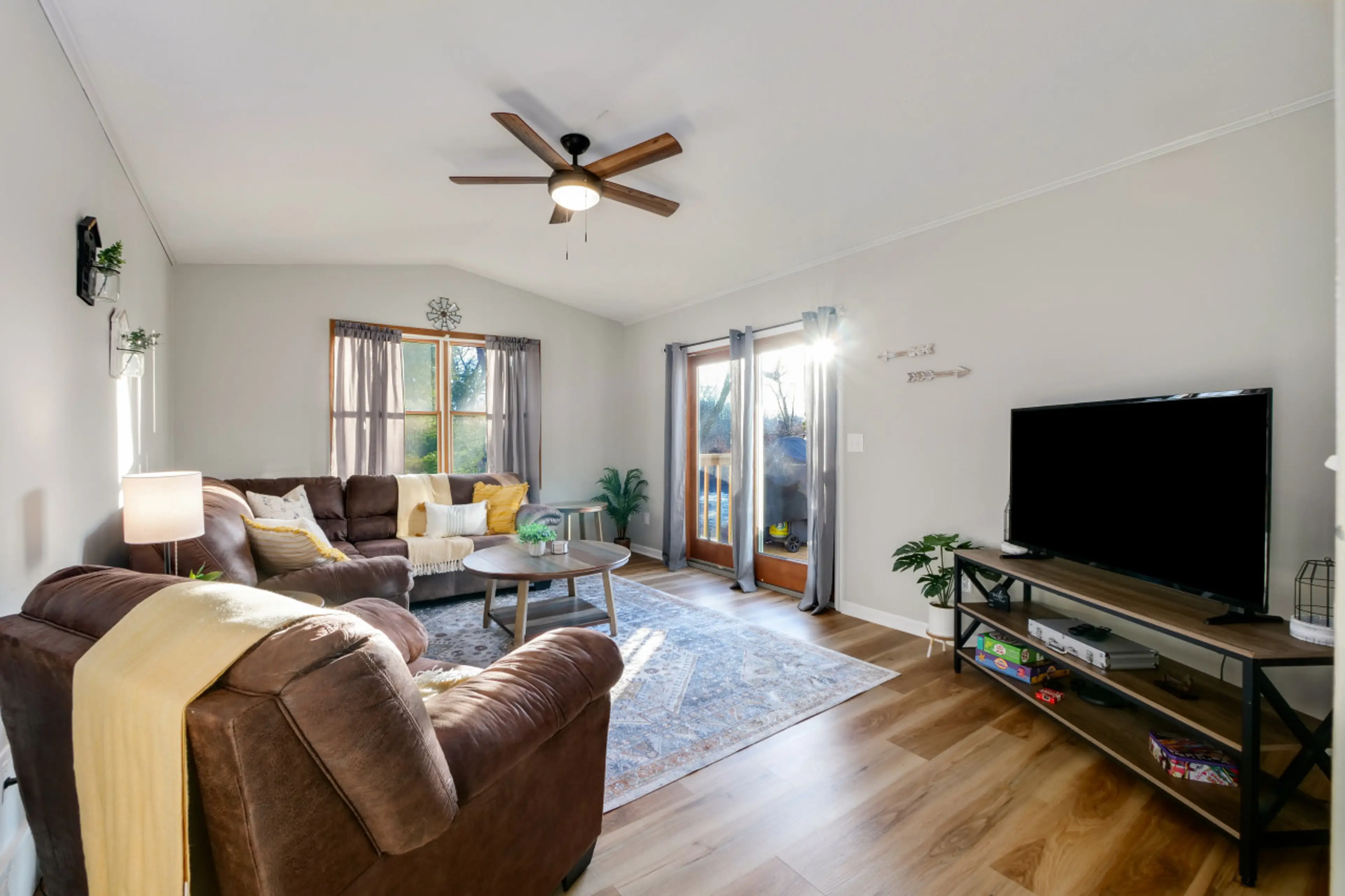 This inviting space is designed for relaxation and socializing, with chic furnishings and a layout that maximizes the sense of openness.