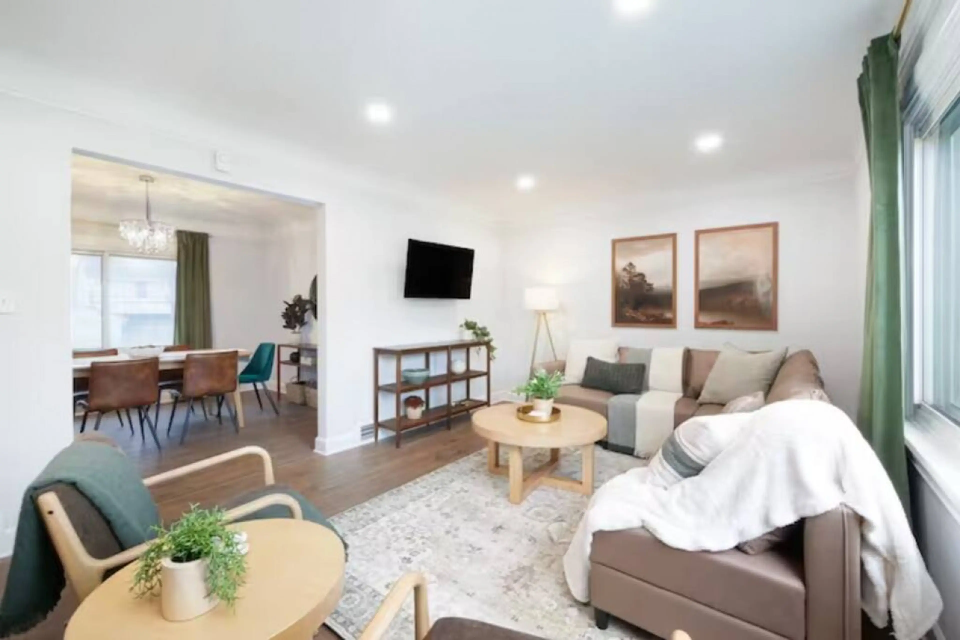 Enjoy movie nights or unwind with a book in this serene living space. Soft tones, plush seating, and natural light make it the perfect spot to recharge.