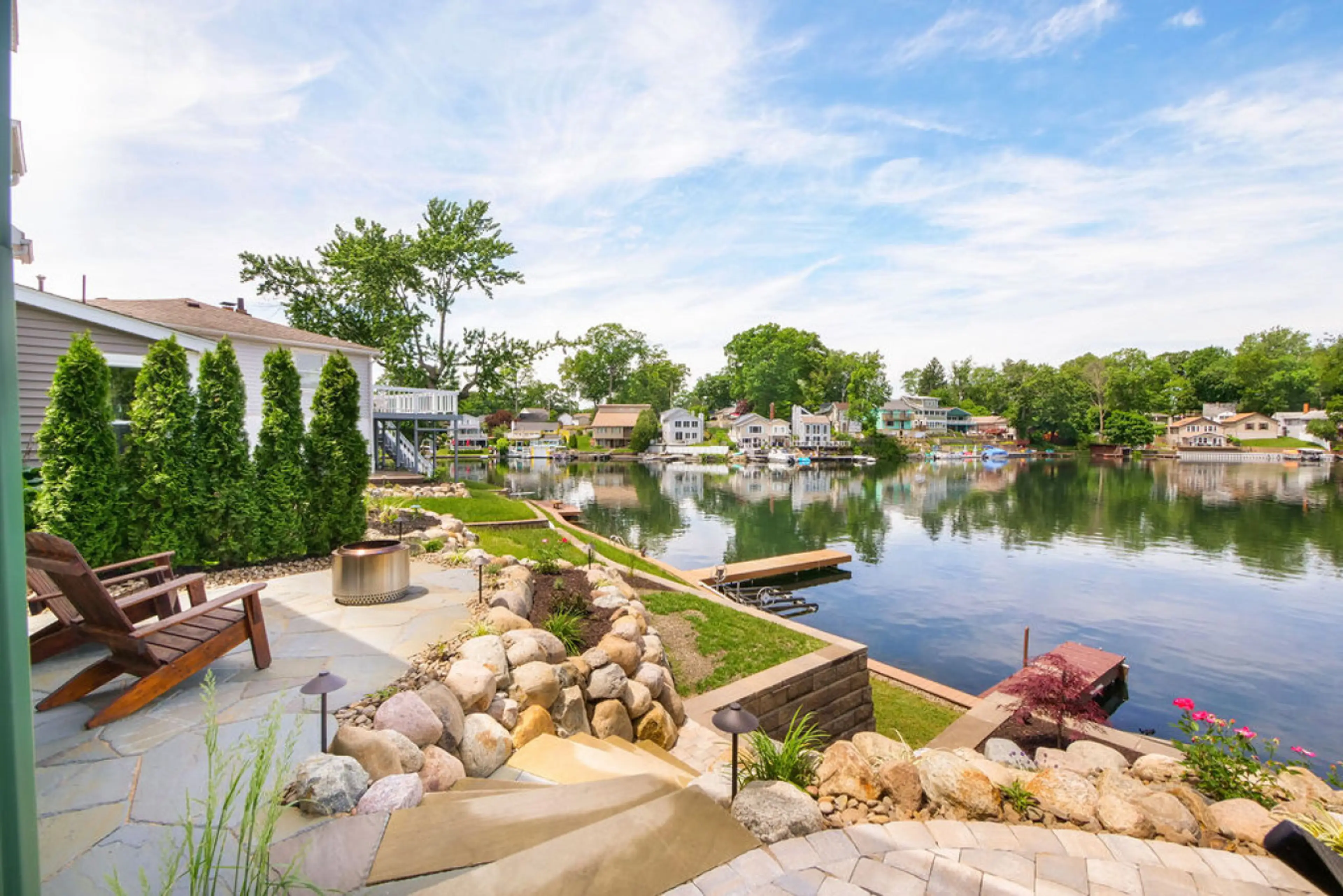 Soak in the peaceful lakefront views 🌊🌿 with a private dock, fire pit seating, and beautifully landscaped paths. Perfect for sipping coffee or enjoying golden hour by the water. 🔥🪵