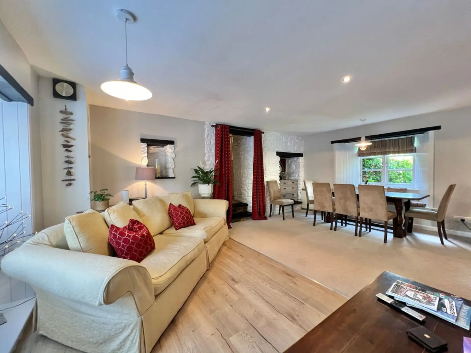 Formal dining area and tv area with comfy sofa