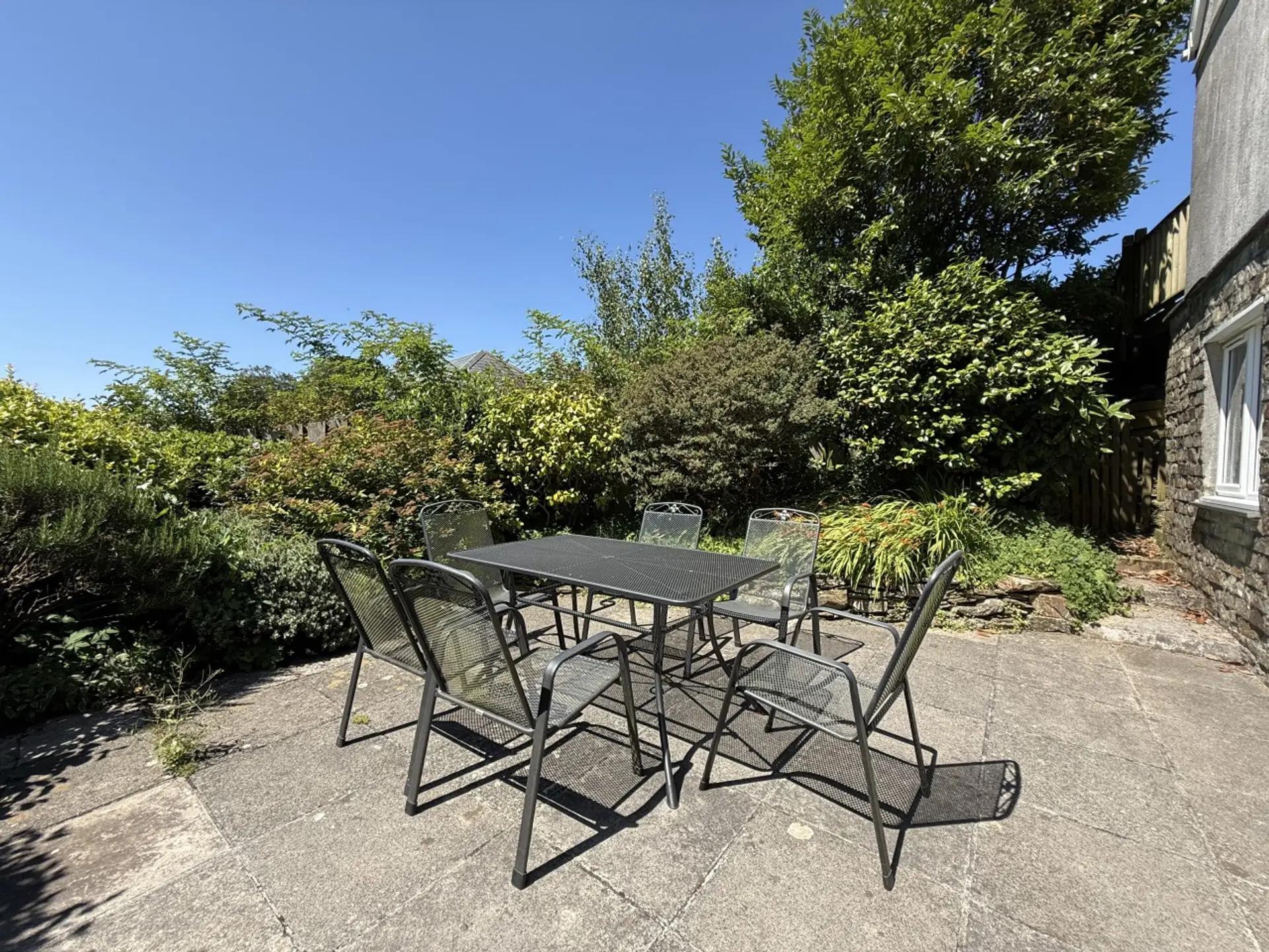 Enjoy al fresco dining in this private patio area
