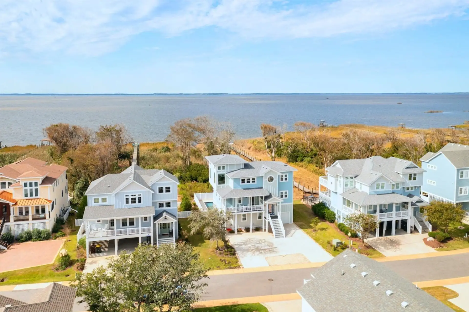 Aerial view of the surrounding homes, showcasing the laid-back coastal setting.